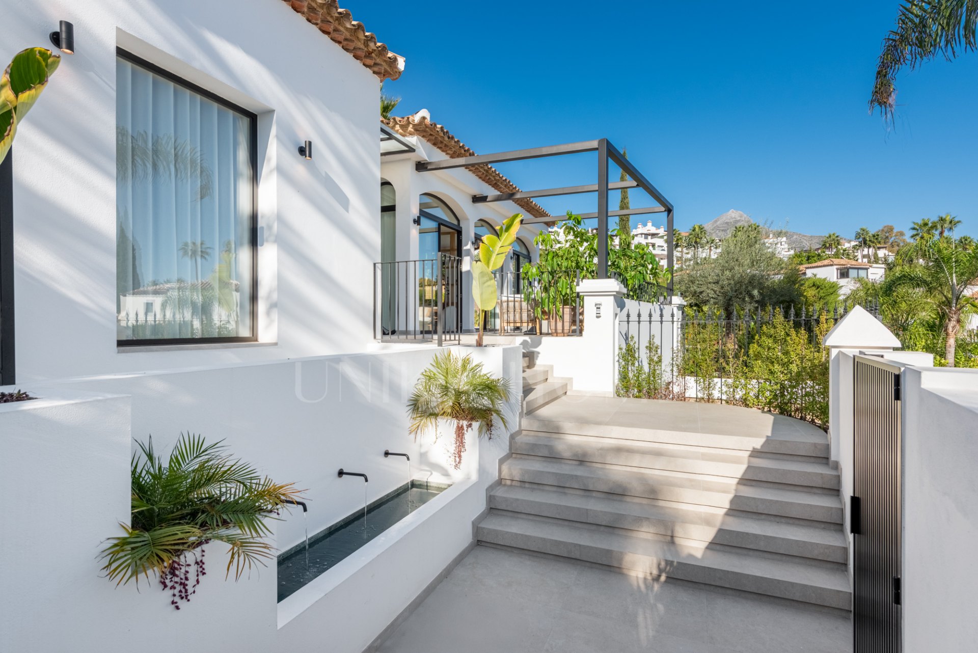 Top-renovated villa hidden inside a gated community in Nueva Andalucía.