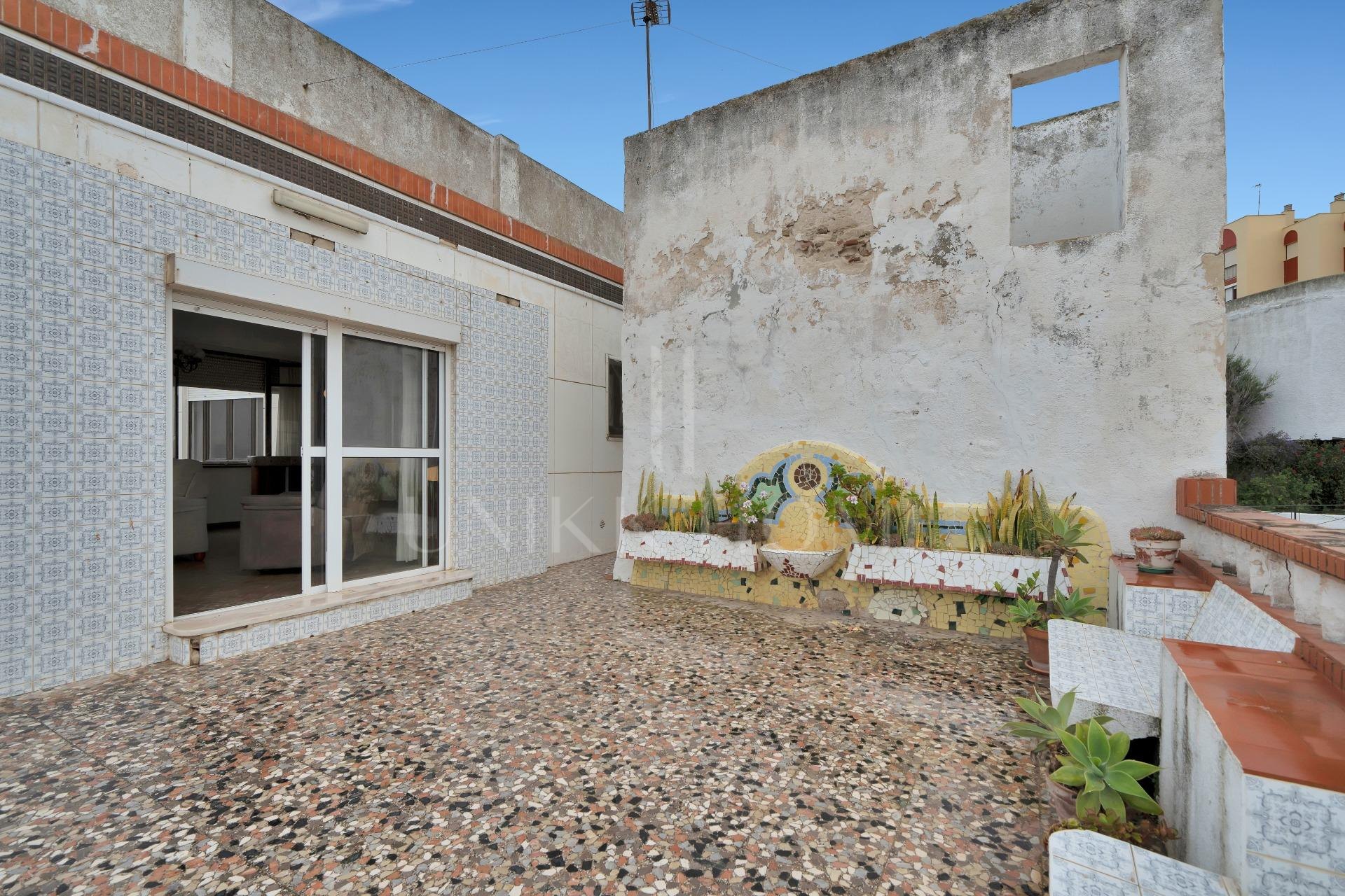 HOUSE IN THE HISTORIC CENTER OF TARIFA ON THE MEDIEVAL WALL.
