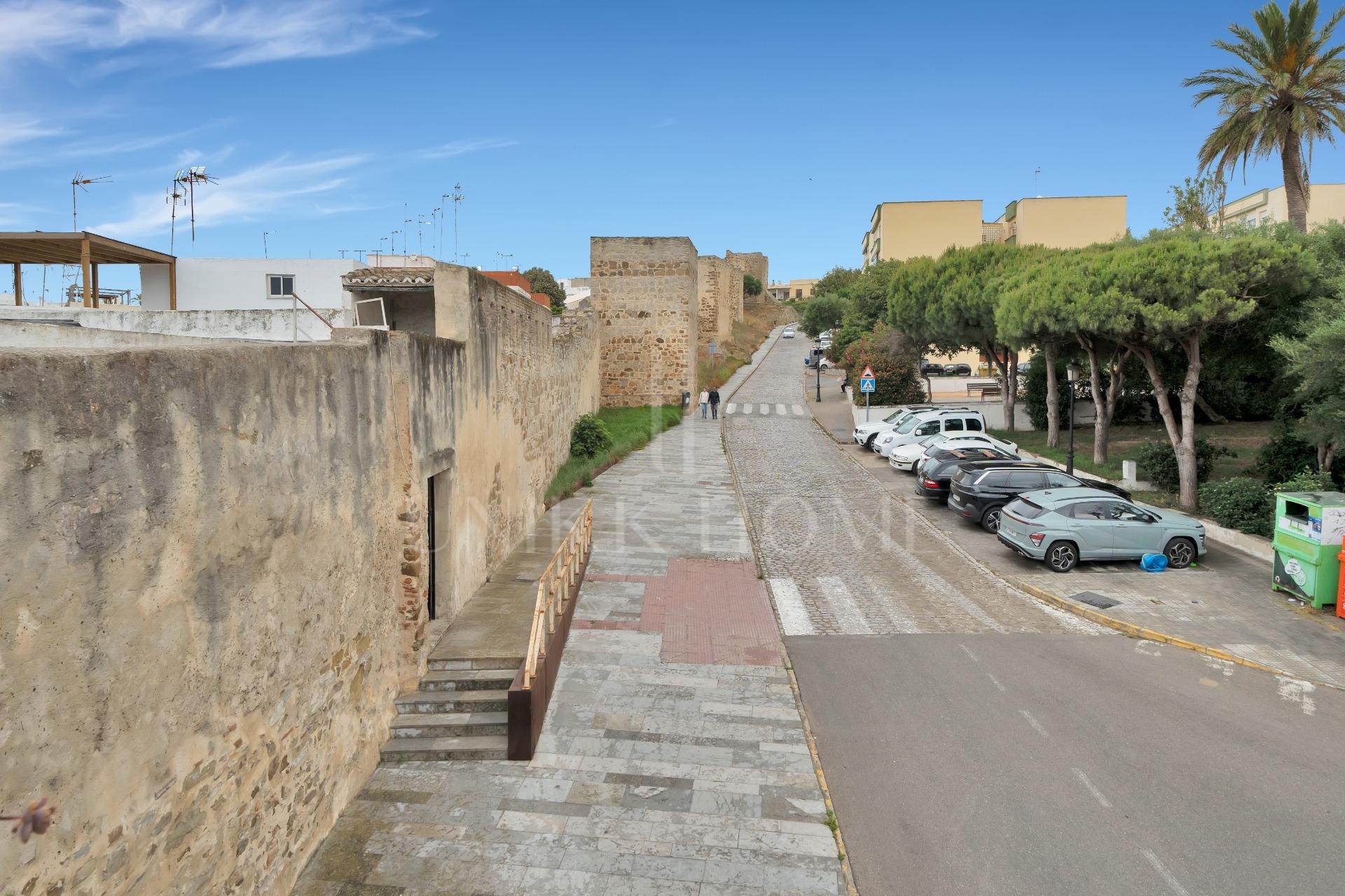 HOUSE IN THE HISTORIC CENTER OF TARIFA ON THE MEDIEVAL WALL.