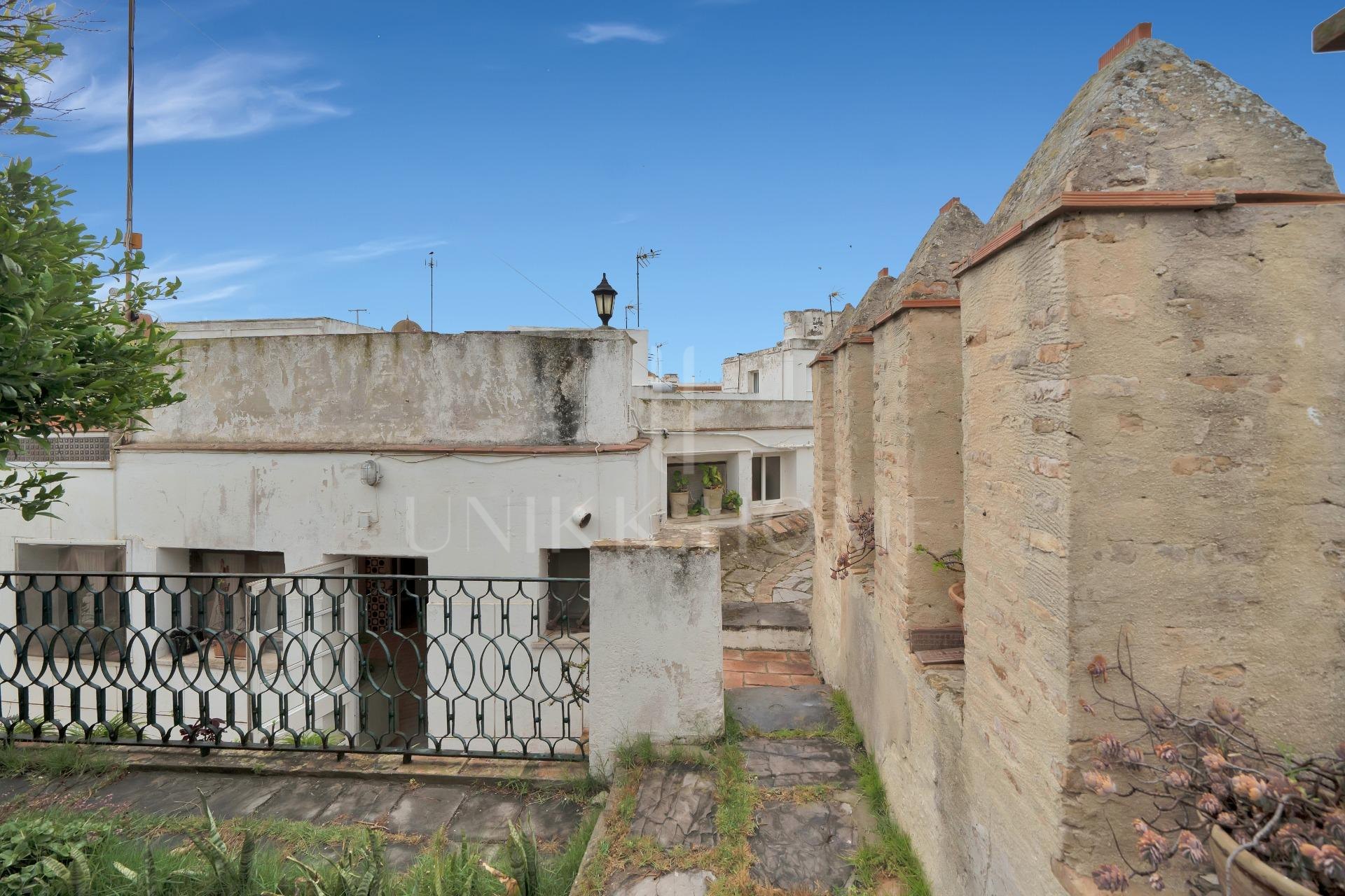 HOUSE IN THE HISTORIC CENTER OF TARIFA ON THE MEDIEVAL WALL.