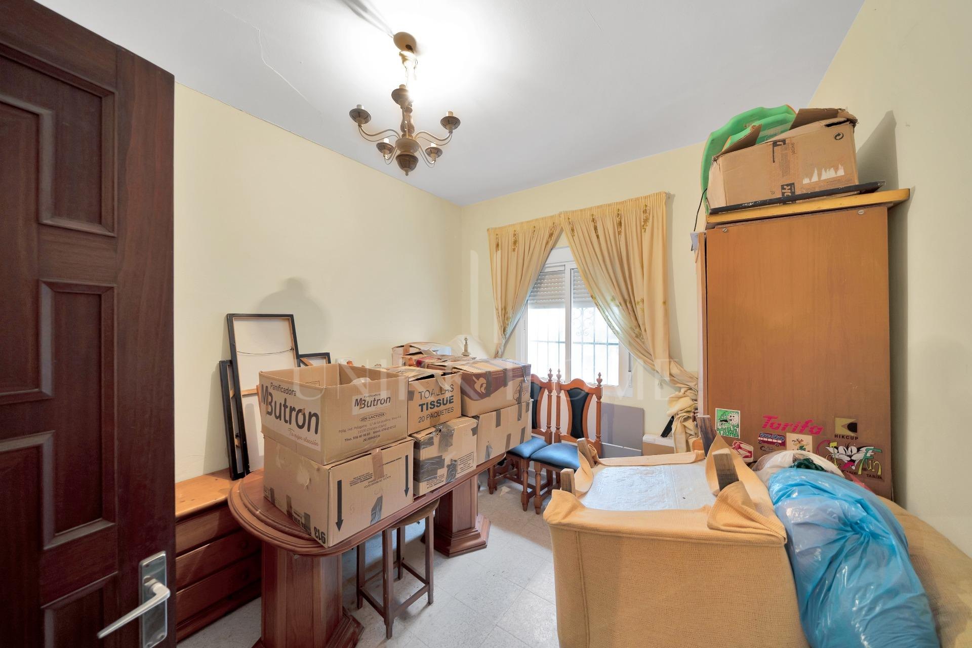 HOUSE IN THE HISTORIC CENTER OF TARIFA ON THE MEDIEVAL WALL.