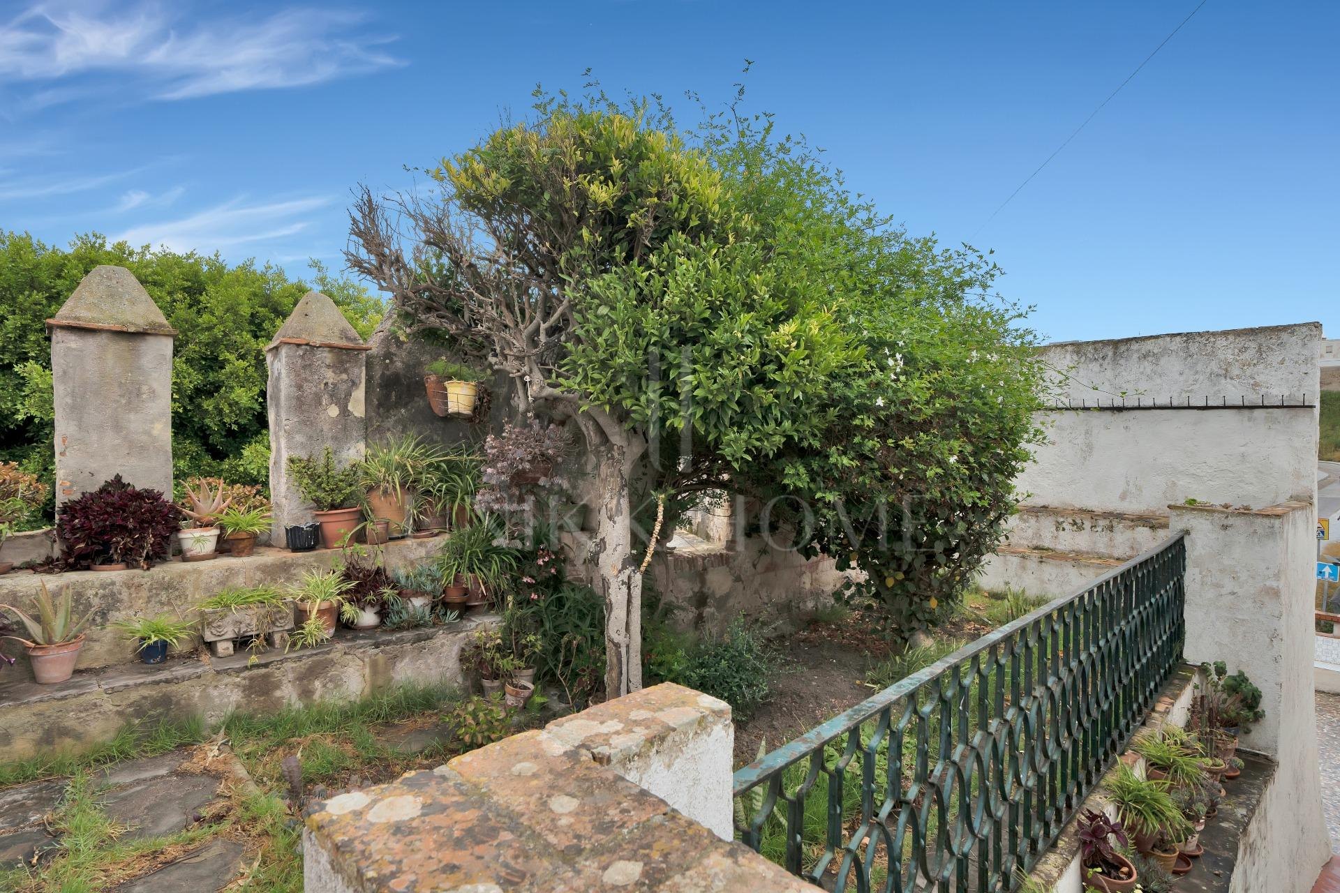 HOUSE IN THE HISTORIC CENTER OF TARIFA ON THE MEDIEVAL WALL.