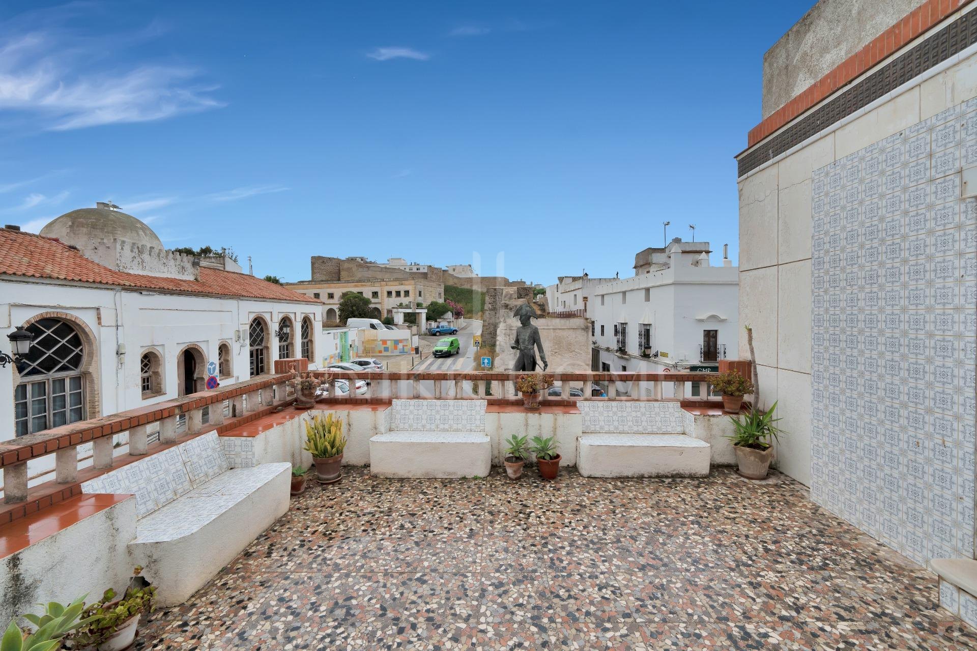 HOUSE IN THE HISTORIC CENTER OF TARIFA ON THE MEDIEVAL WALL.