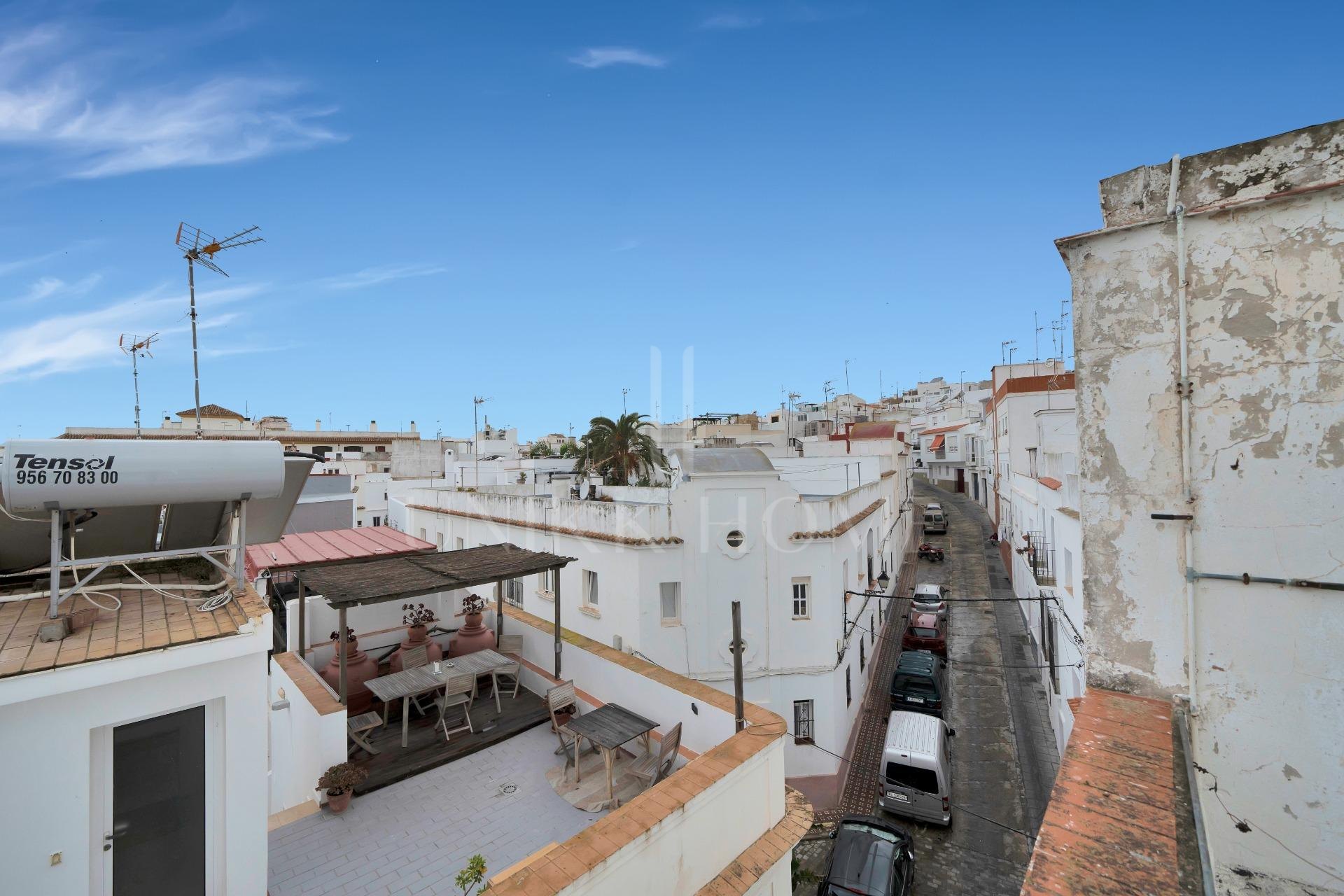 HOUSE IN THE HISTORIC CENTER OF TARIFA ON THE MEDIEVAL WALL.