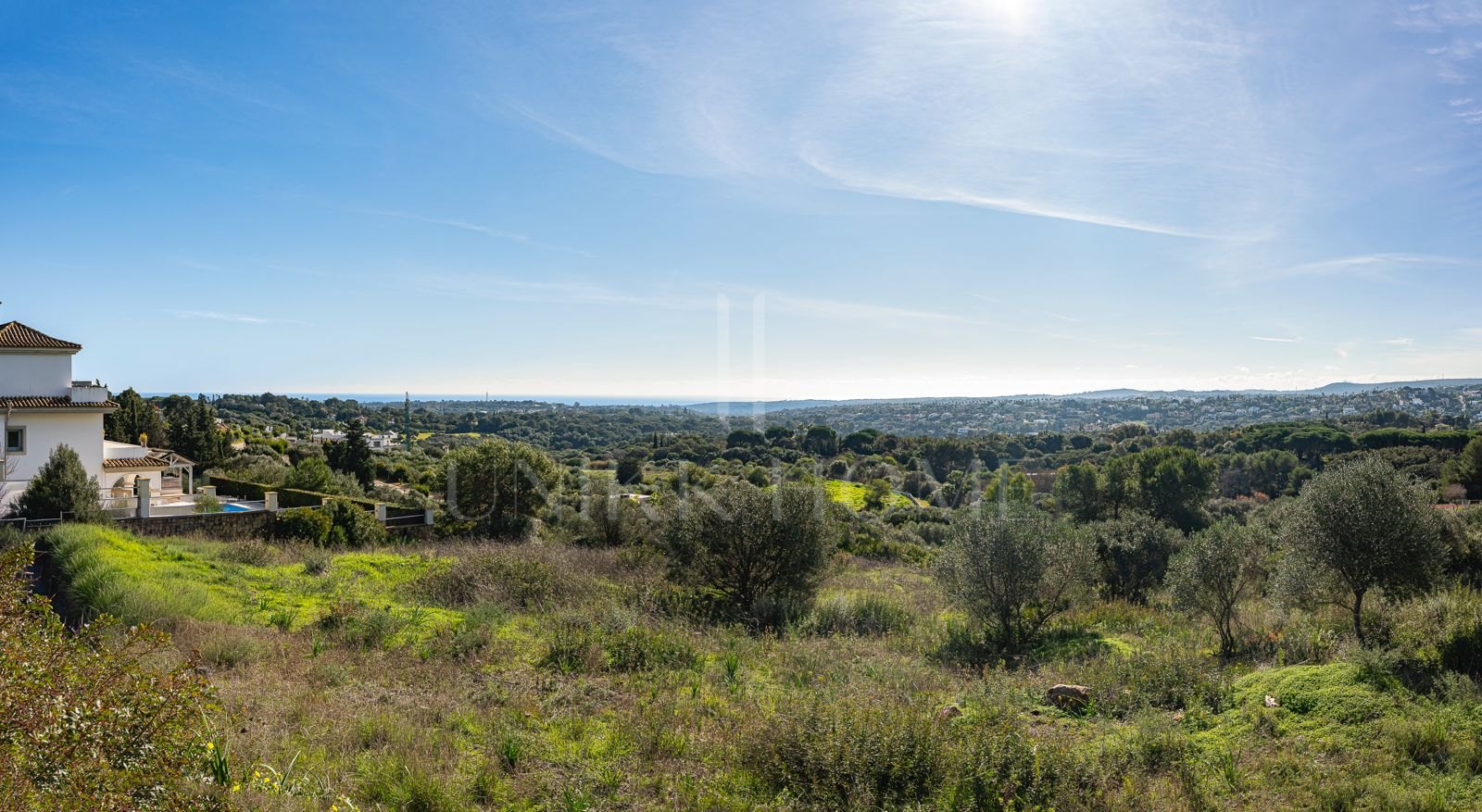 Large south-facing plot with sea views