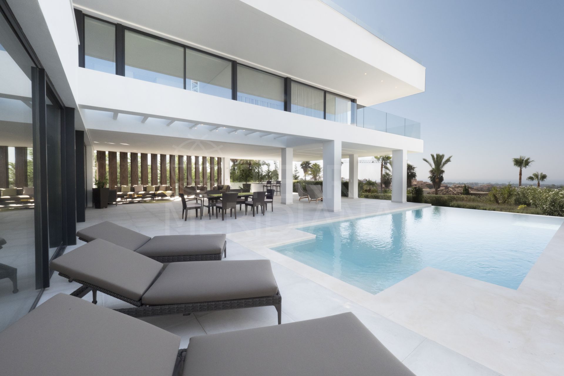 Stunning new modern villa with endless views for sale in La Alquería, Benahavís