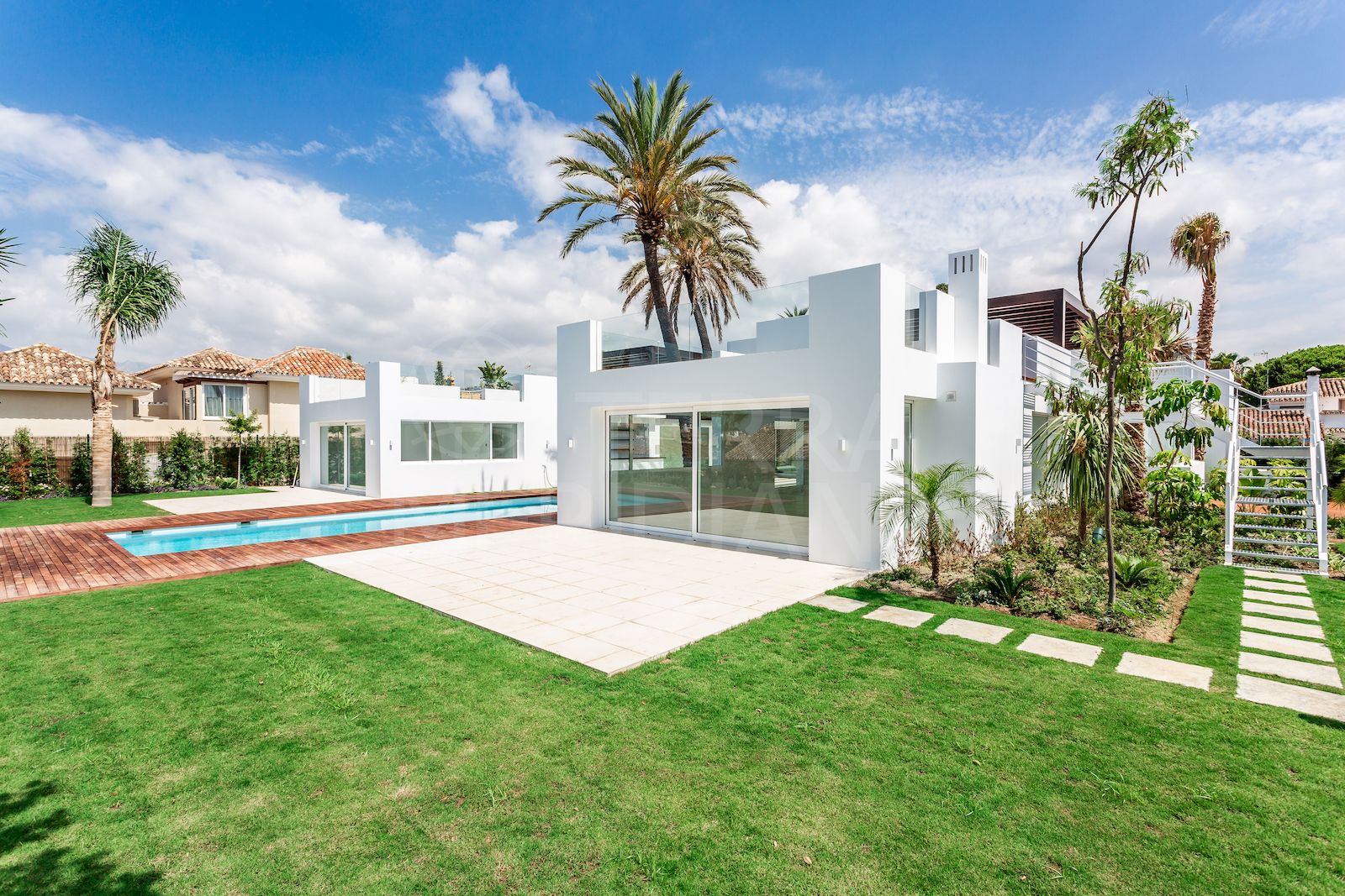Beachside state-of-the-art villa with 2 large rooftop terraces for sale in El Rosario, Marbella East
