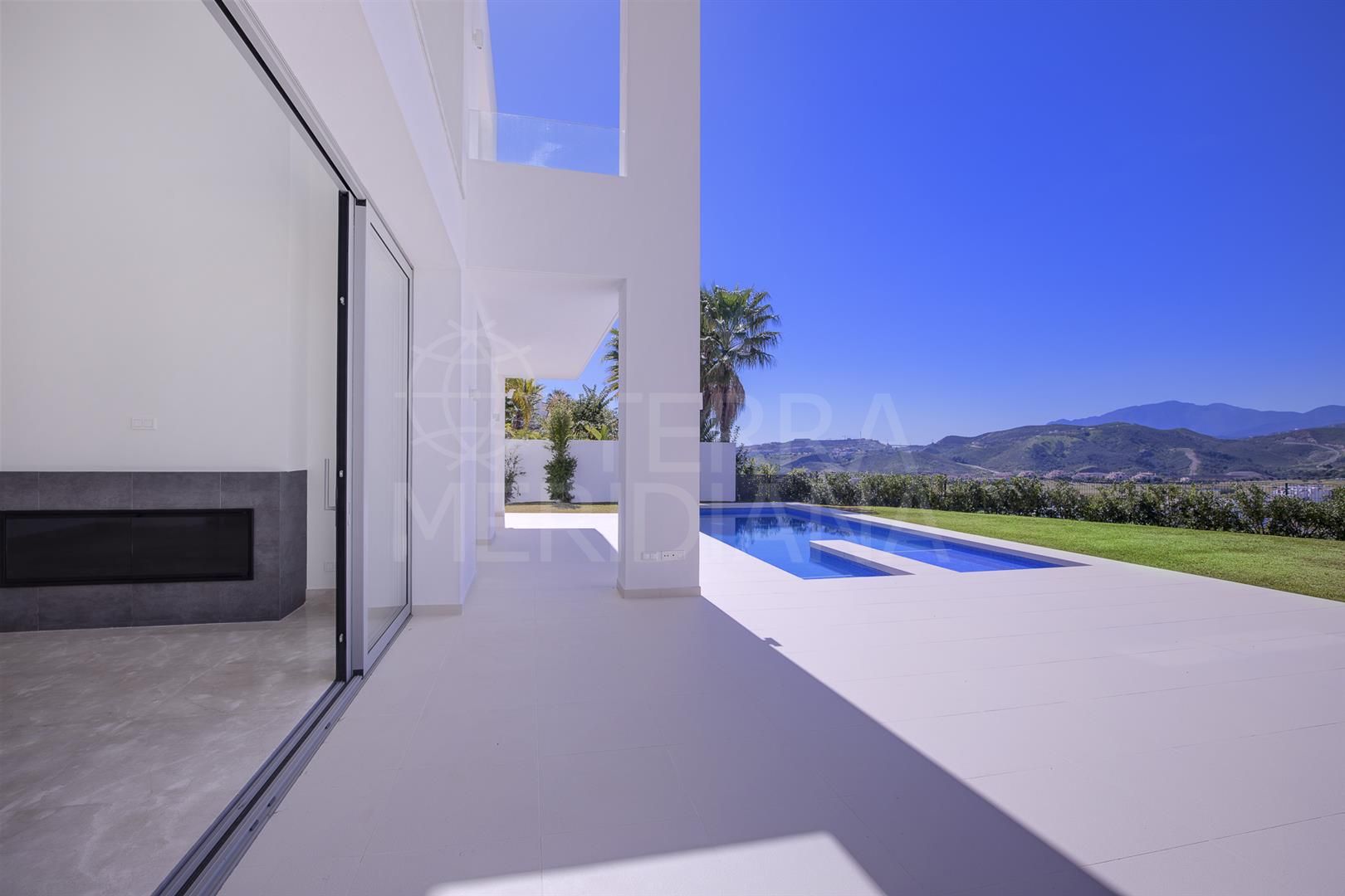 New contemporary luxury villa with unbeatable sea and golf views for sale in Puerto del Capitan, Benahavis