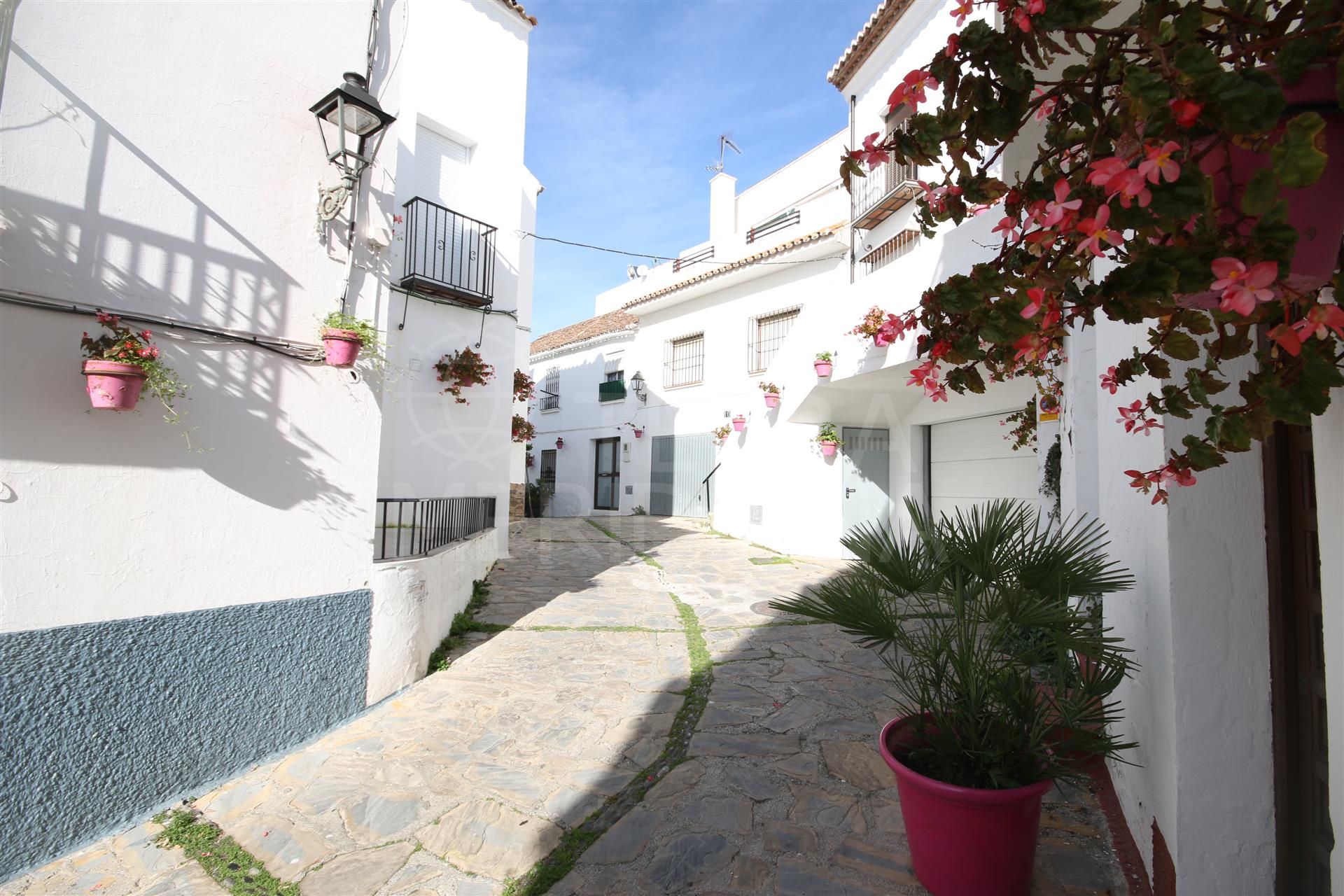 Large townhouse for sale in the old town of Estepona, with sunny solarium terrace