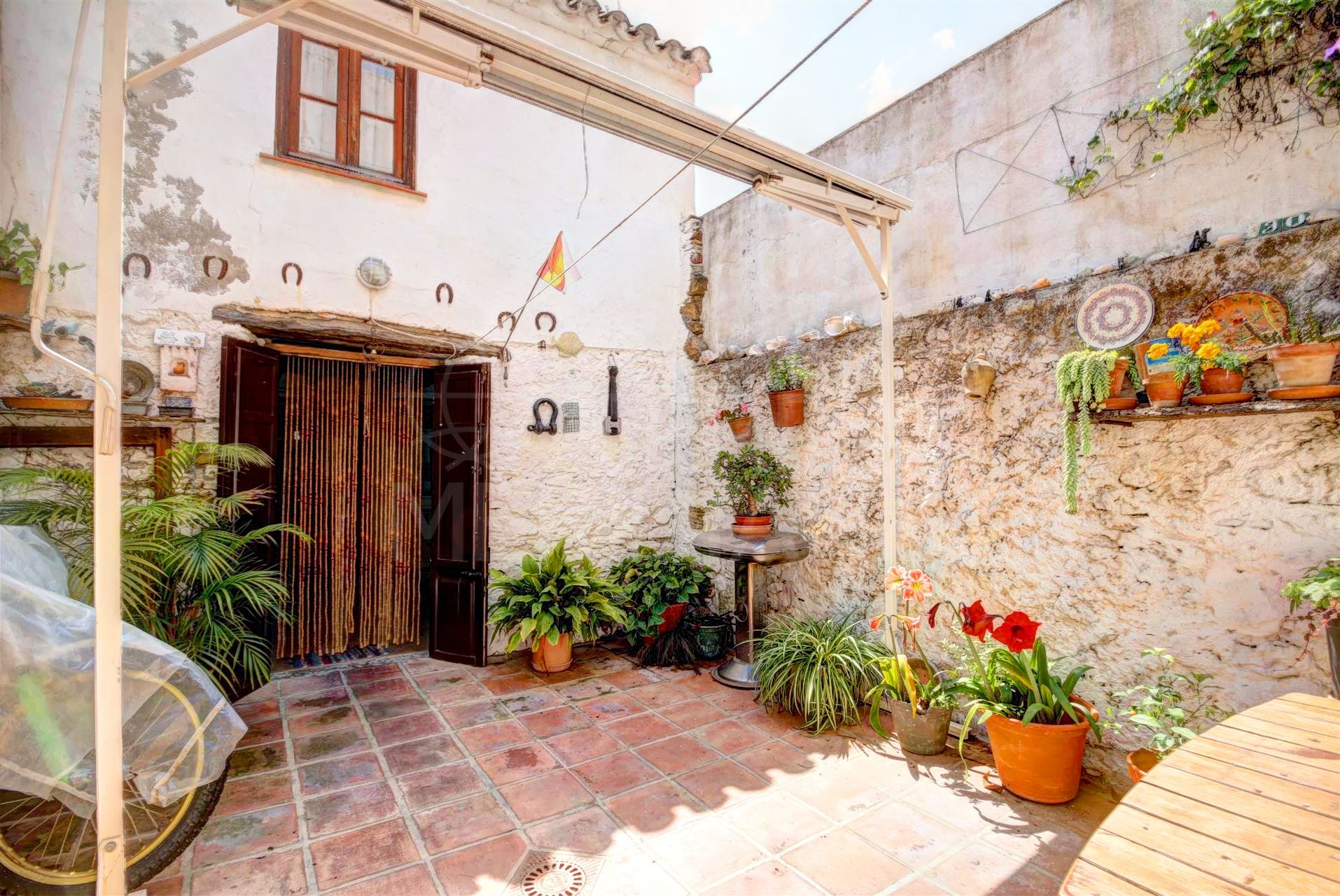 Traditional townhouse for sale in Estepona old town, with patio and 2 terraces