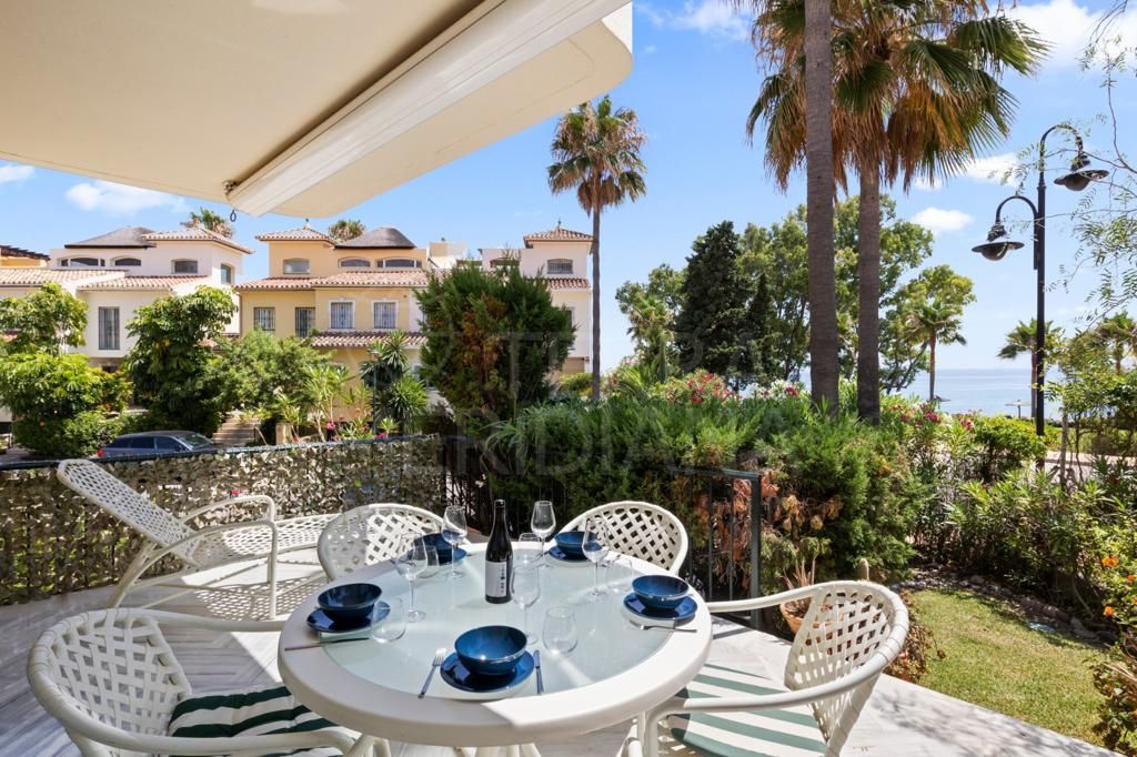 Upgraded townhouse with rooftop terrace and superb sea views for sale in Garden Beach, Estepona