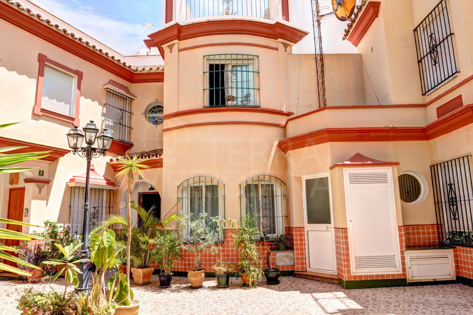 Townhouse for sale in a gated community with private parking and storage, Estepona old town