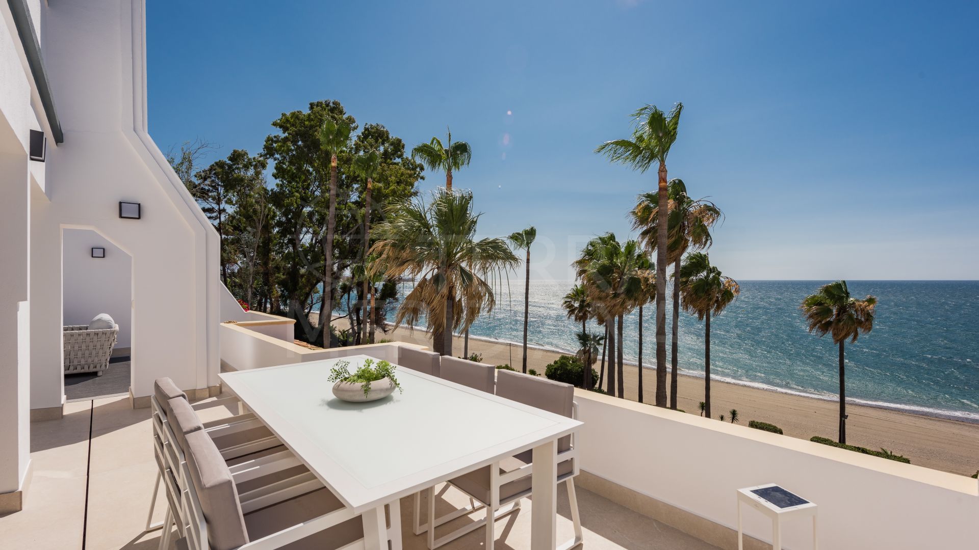 Newly redone custom penthouse with designer finishes for sale in beachfront Dominion Beach, Estepona