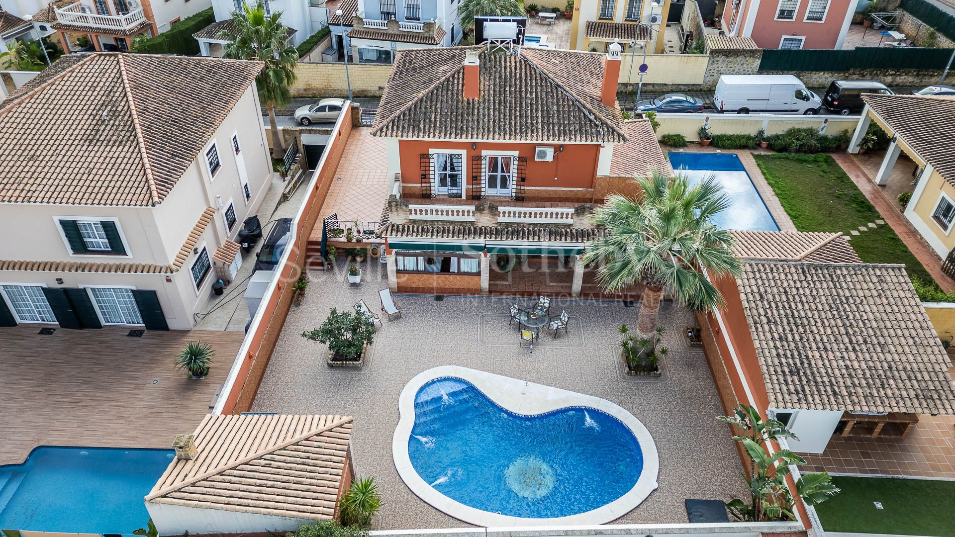 Two-story detached house with pool.