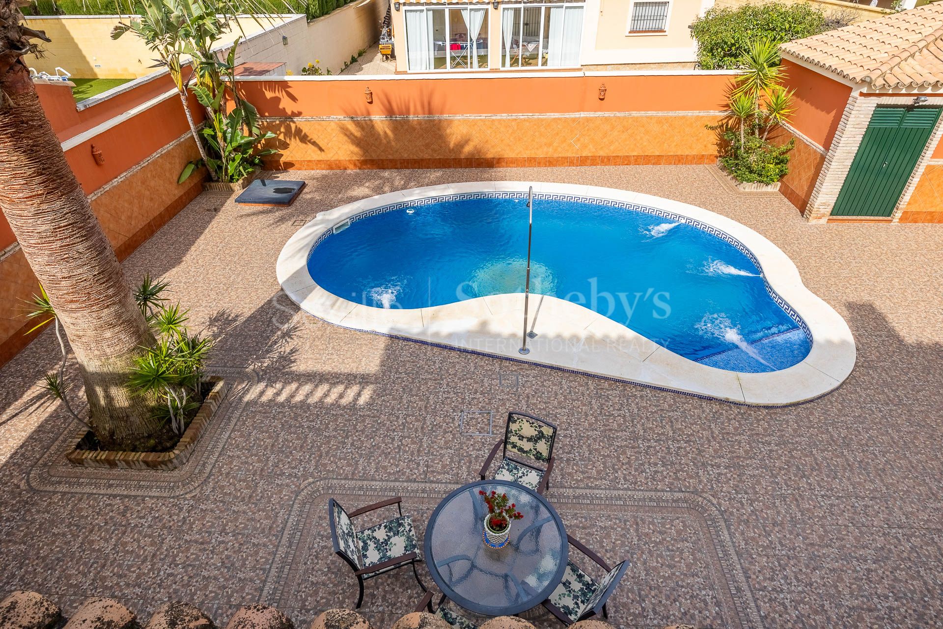 Two-story detached house with pool.