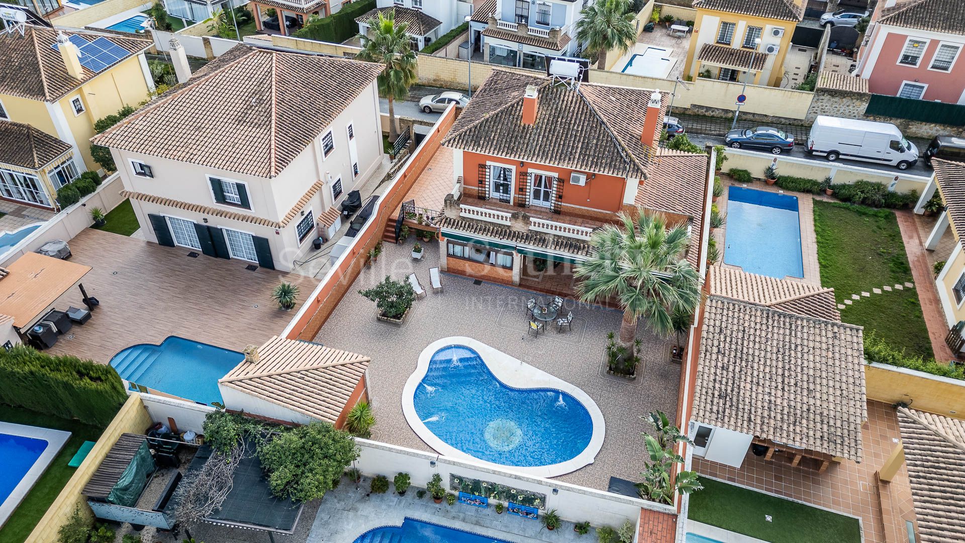 Two-story detached house with pool.