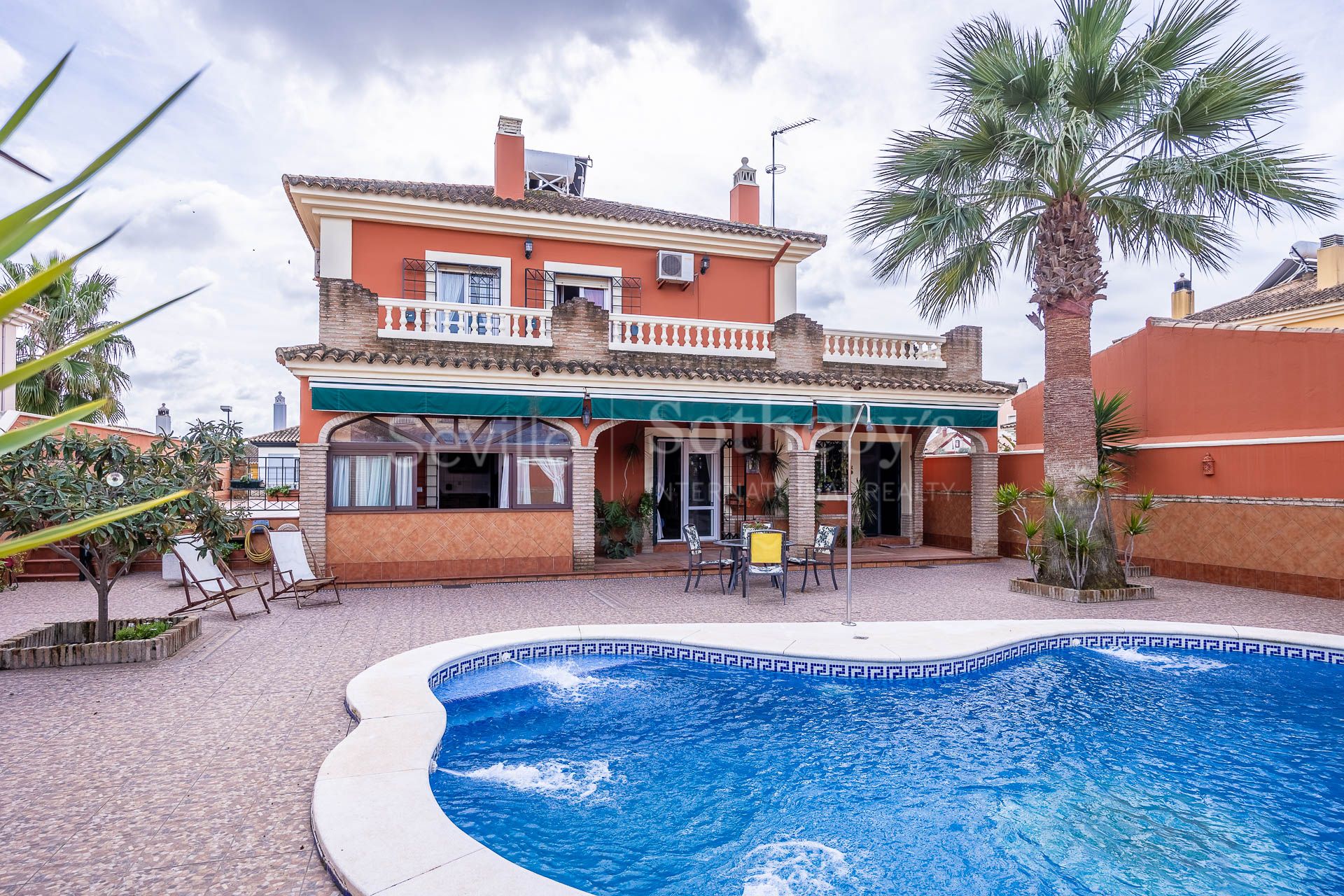 Two-story detached house with pool.