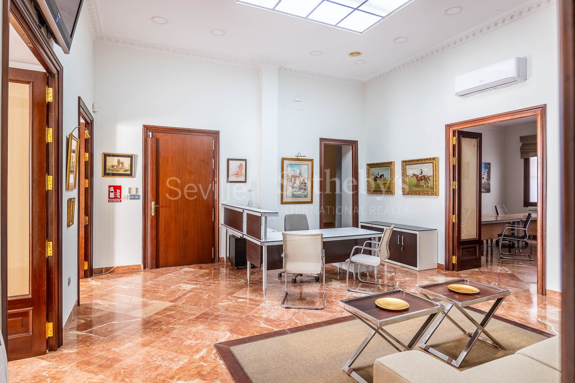 The property is located in the centre of Seville with prominent balconies facing Zaragoza Street