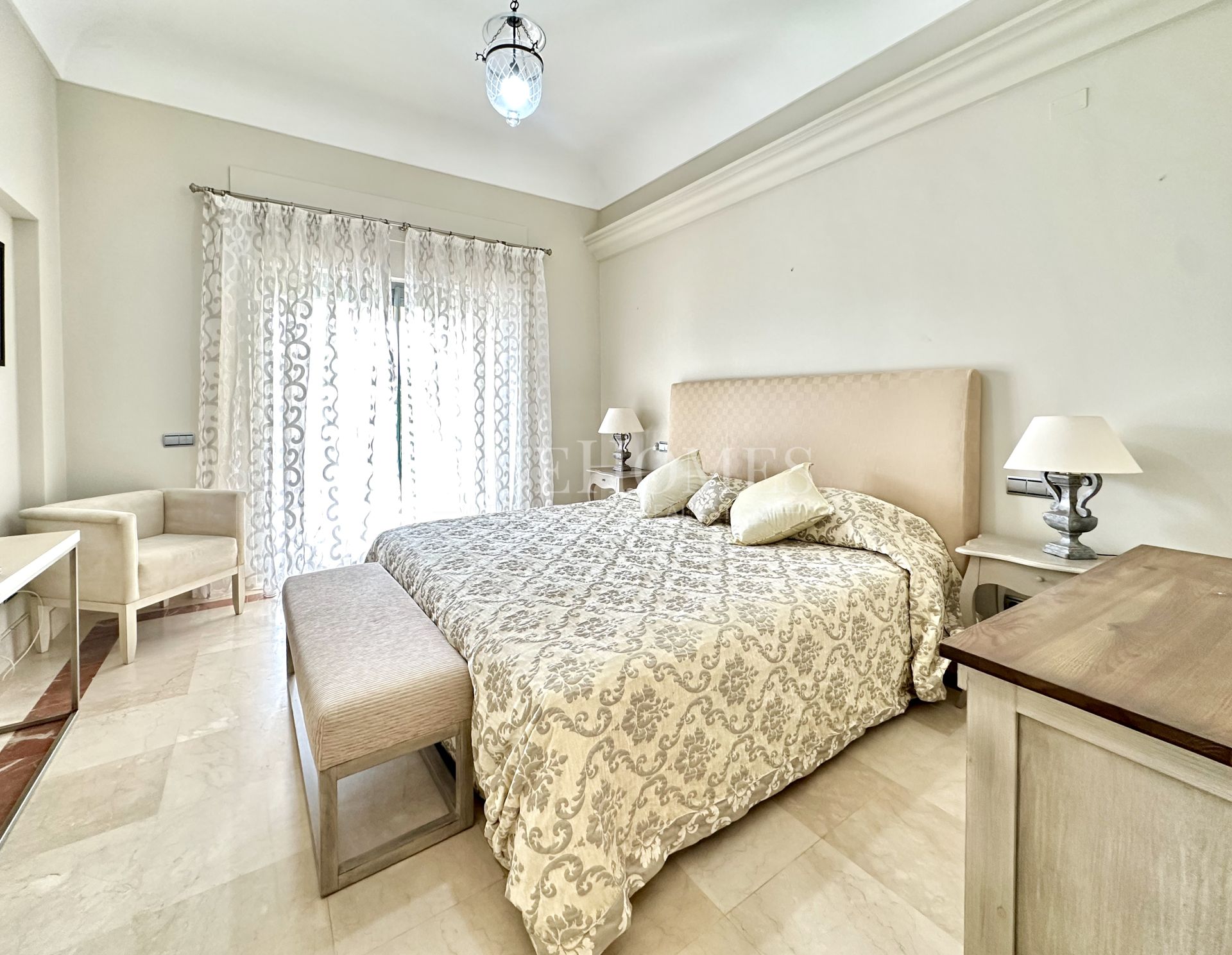 Apartment with private garden and pool in La Marina de Sotogrande