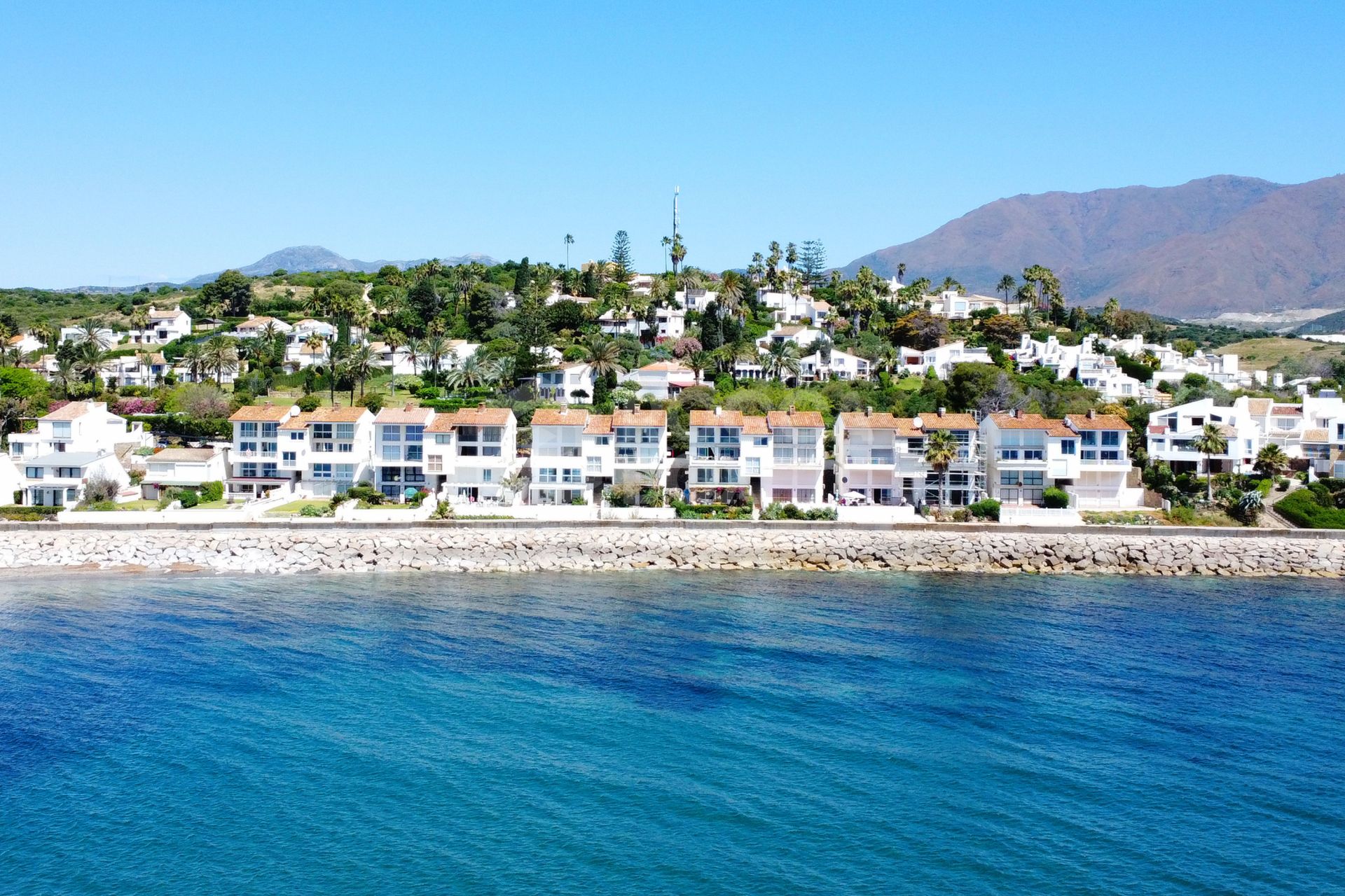 Spectacular Waterfront Duplex with Private Pool & Gardens – Just Steps from the Sea