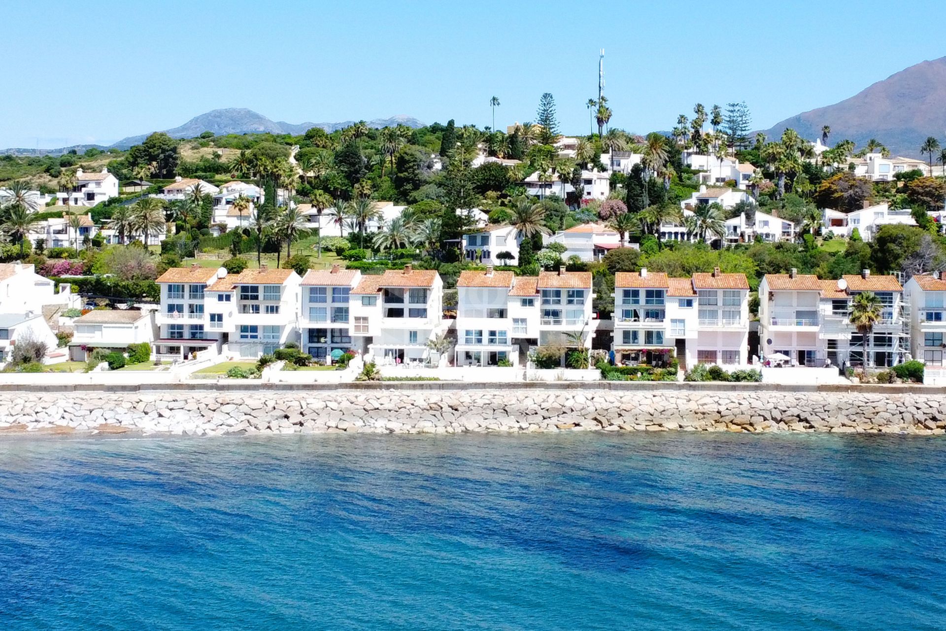 Spectacular Waterfront Duplex with Private Pool & Gardens – Just Steps from the Sea