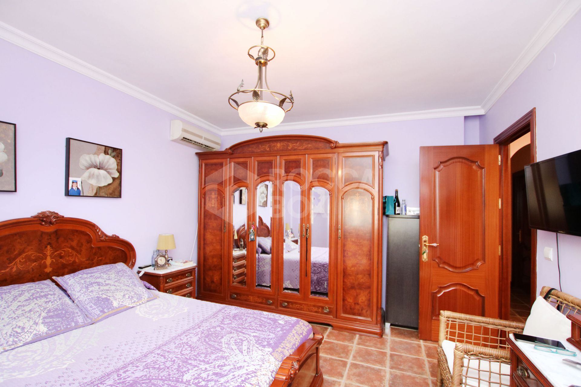An impressive villa is for sale just a 5-minute drive from the beautiful Los Boliches beach, Mijas Costa.