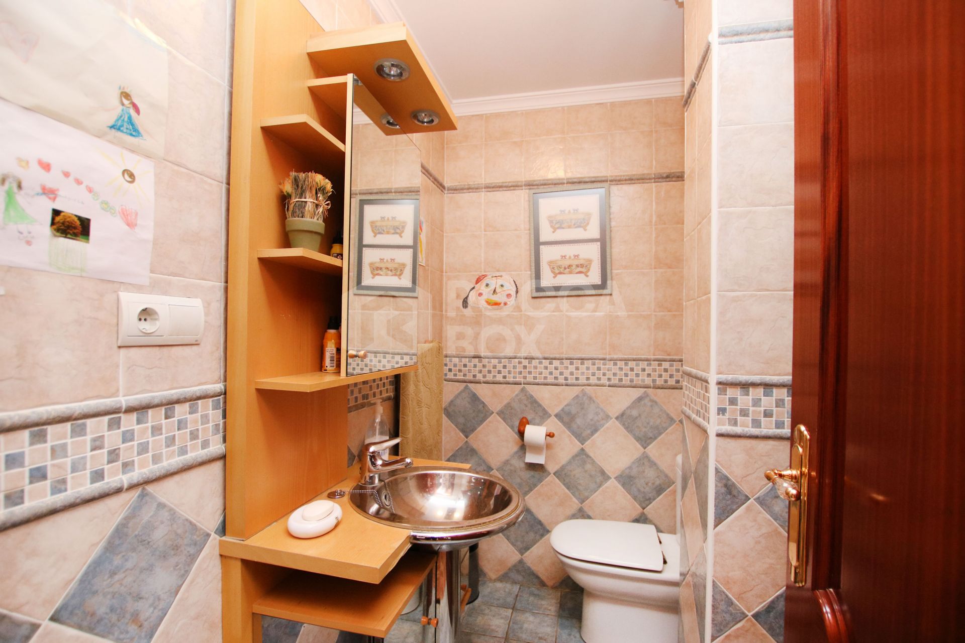 An impressive villa is for sale just a 5-minute drive from the beautiful Los Boliches beach, Mijas Costa.