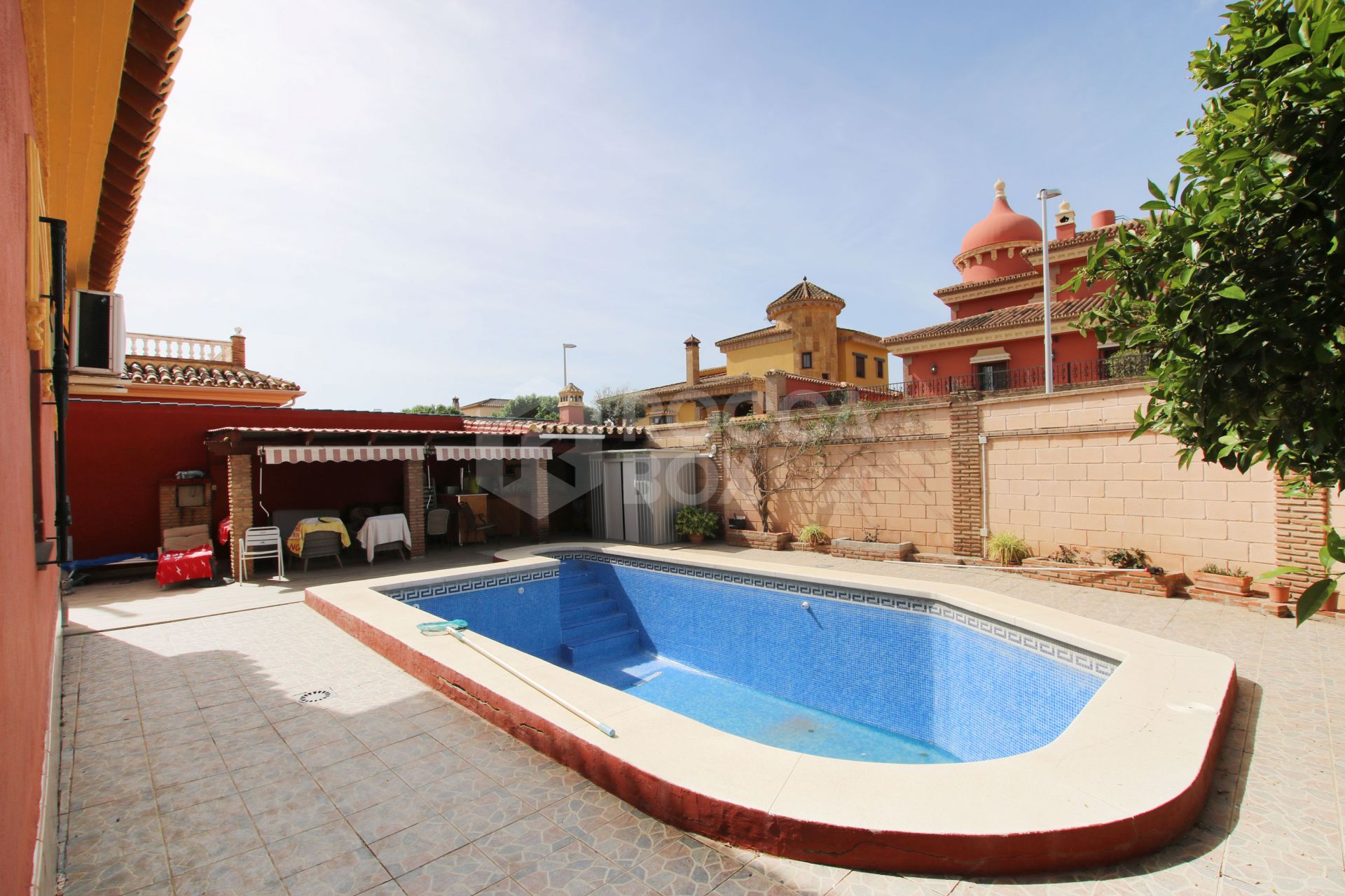 An impressive villa is for sale just a 5-minute drive from the beautiful Los Boliches beach, Mijas Costa.