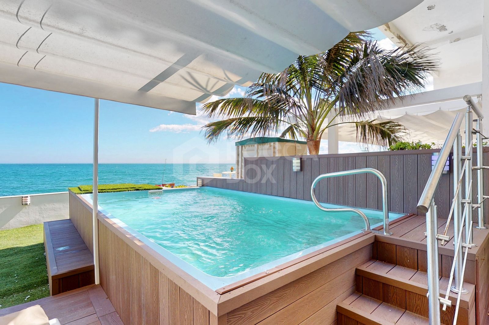 Exclusive frontline beach duplex with private pool and smart home concept