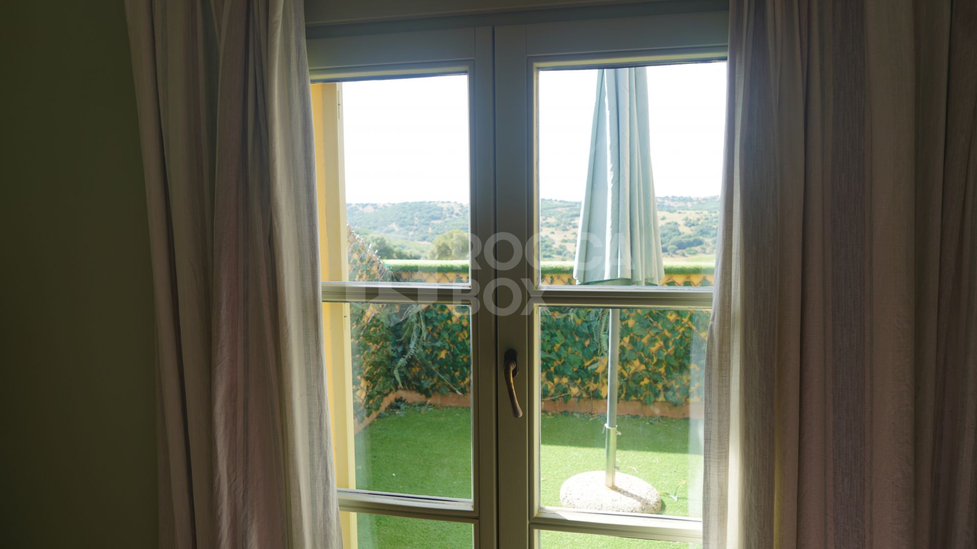 Stylish 4-Bedroom Townhouse in the Exclusive gated Almenara Golf, Panoramic Golf, Mountain & Partial Lake Views in Sotogrande