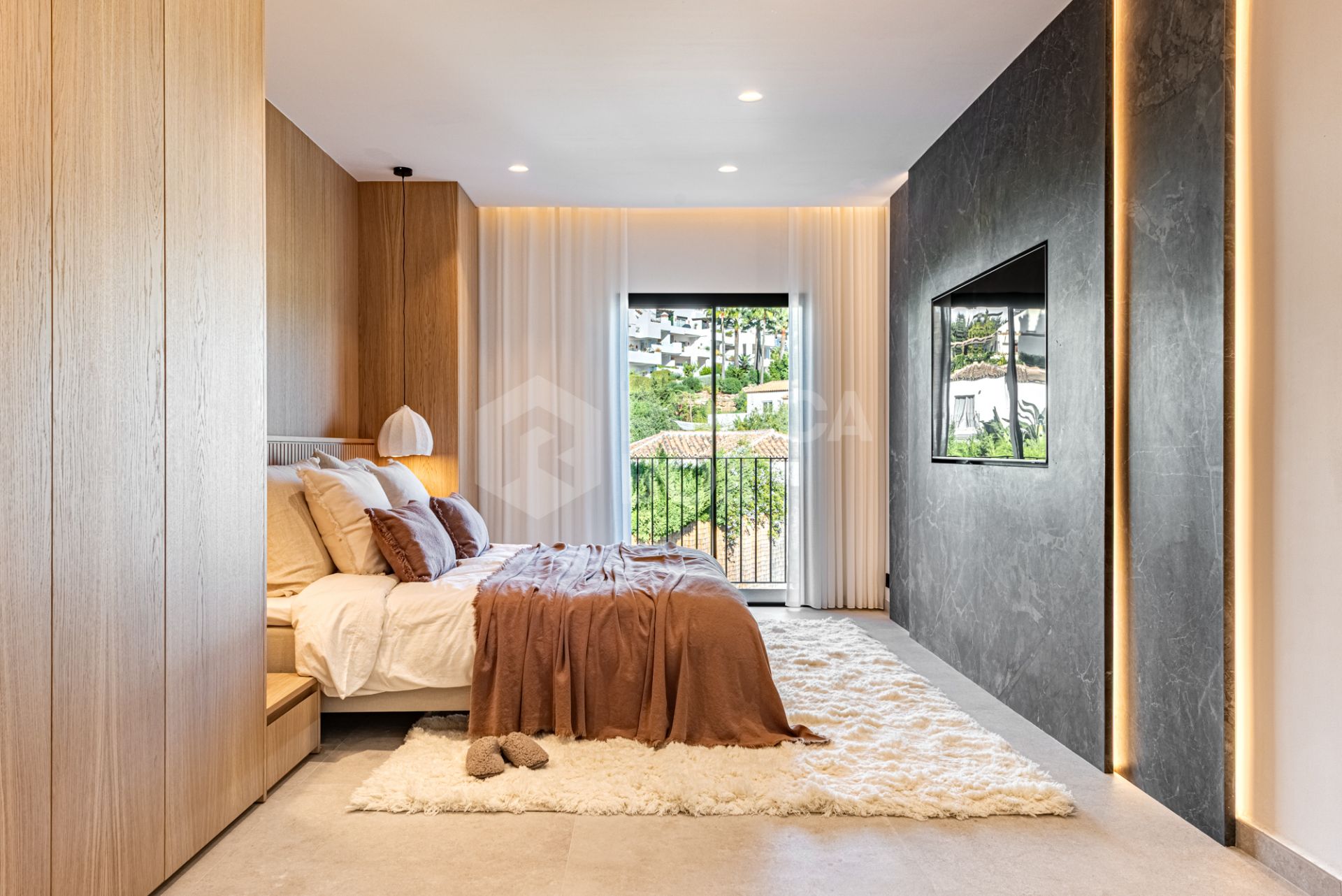 Top-renovated villa hidden inside a gated community in Nueva Andalucía.