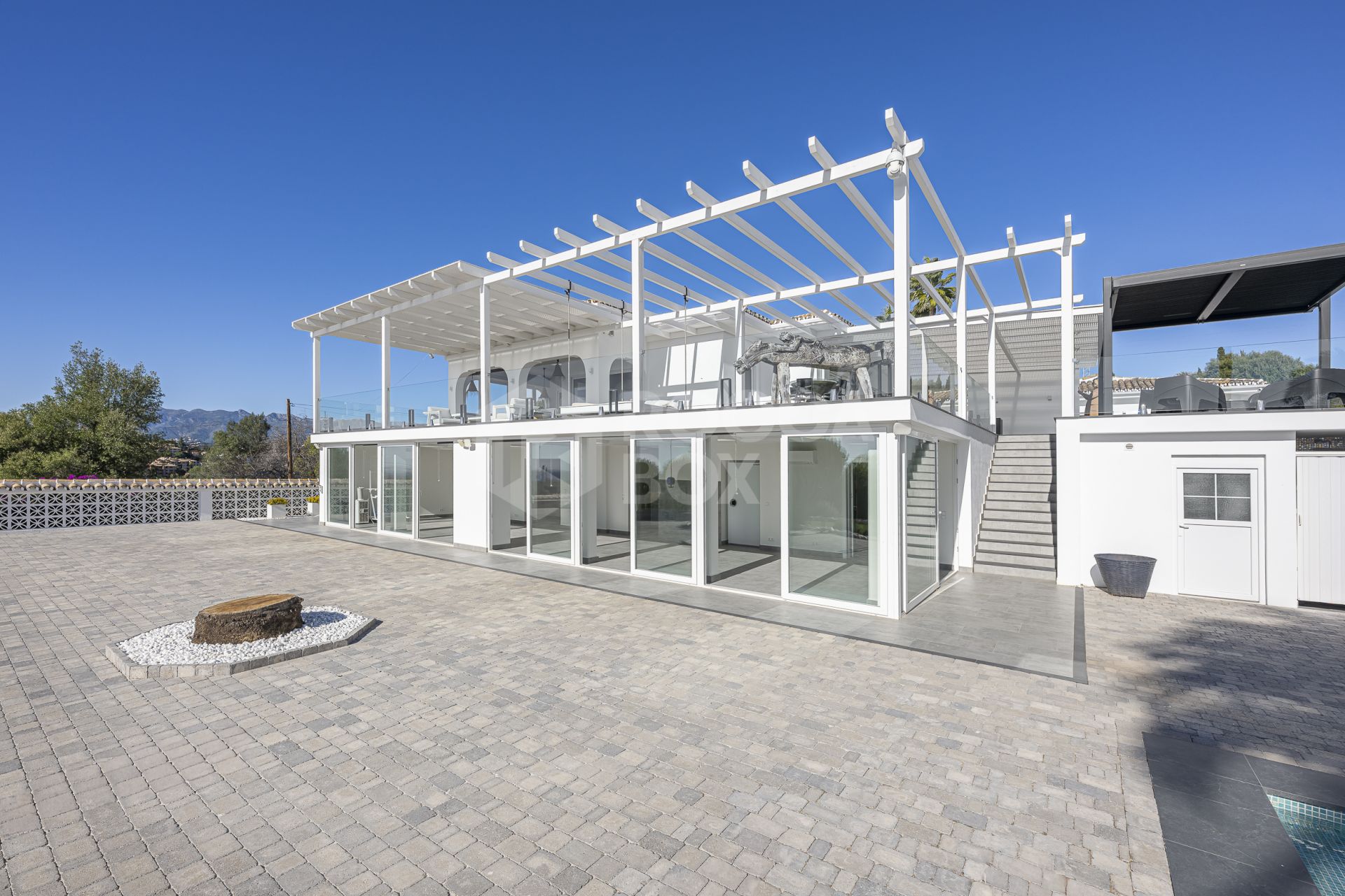 Luxury sea-view villa with development potential for sale in Elviria, Marbella East