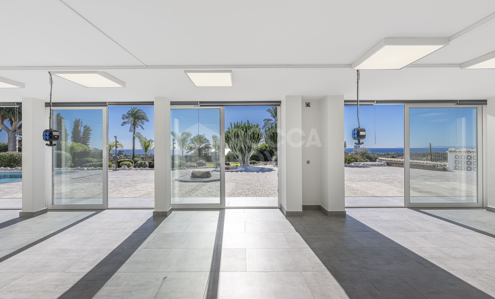 Luxury sea-view villa with development potential for sale in Elviria, Marbella East