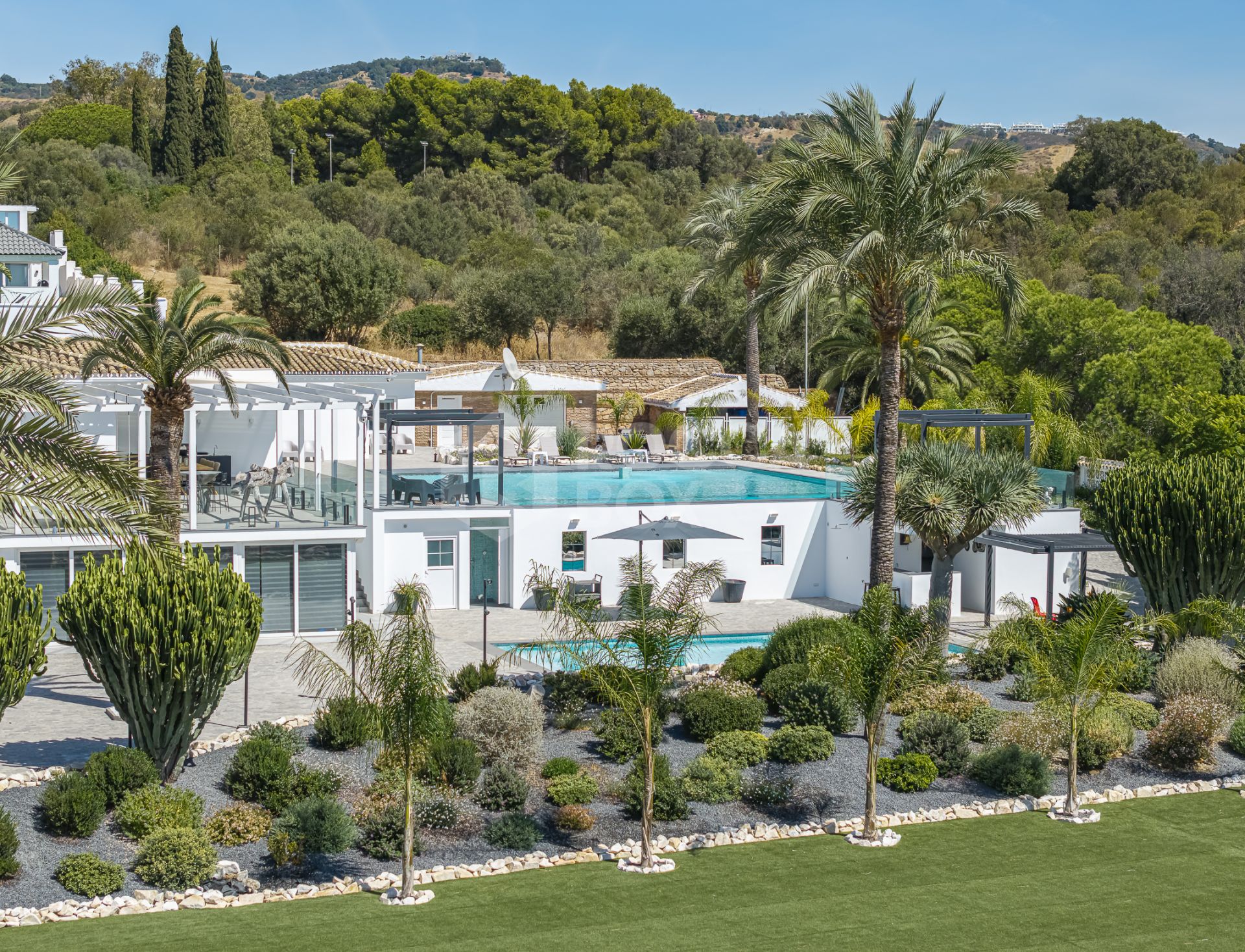 Luxury sea-view villa with development potential for sale in Elviria, Marbella East