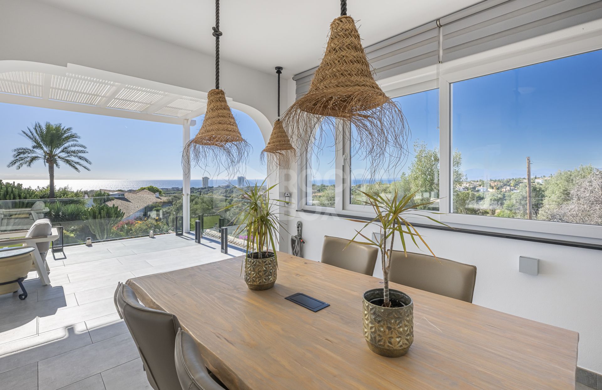 Luxury sea-view villa with development potential for sale in Elviria, Marbella East