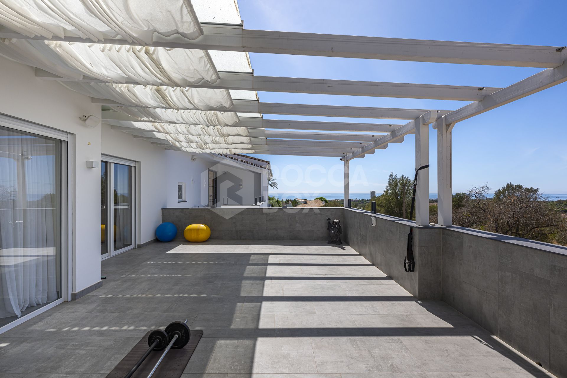 Luxury sea-view villa with development potential for sale in Elviria, Marbella East