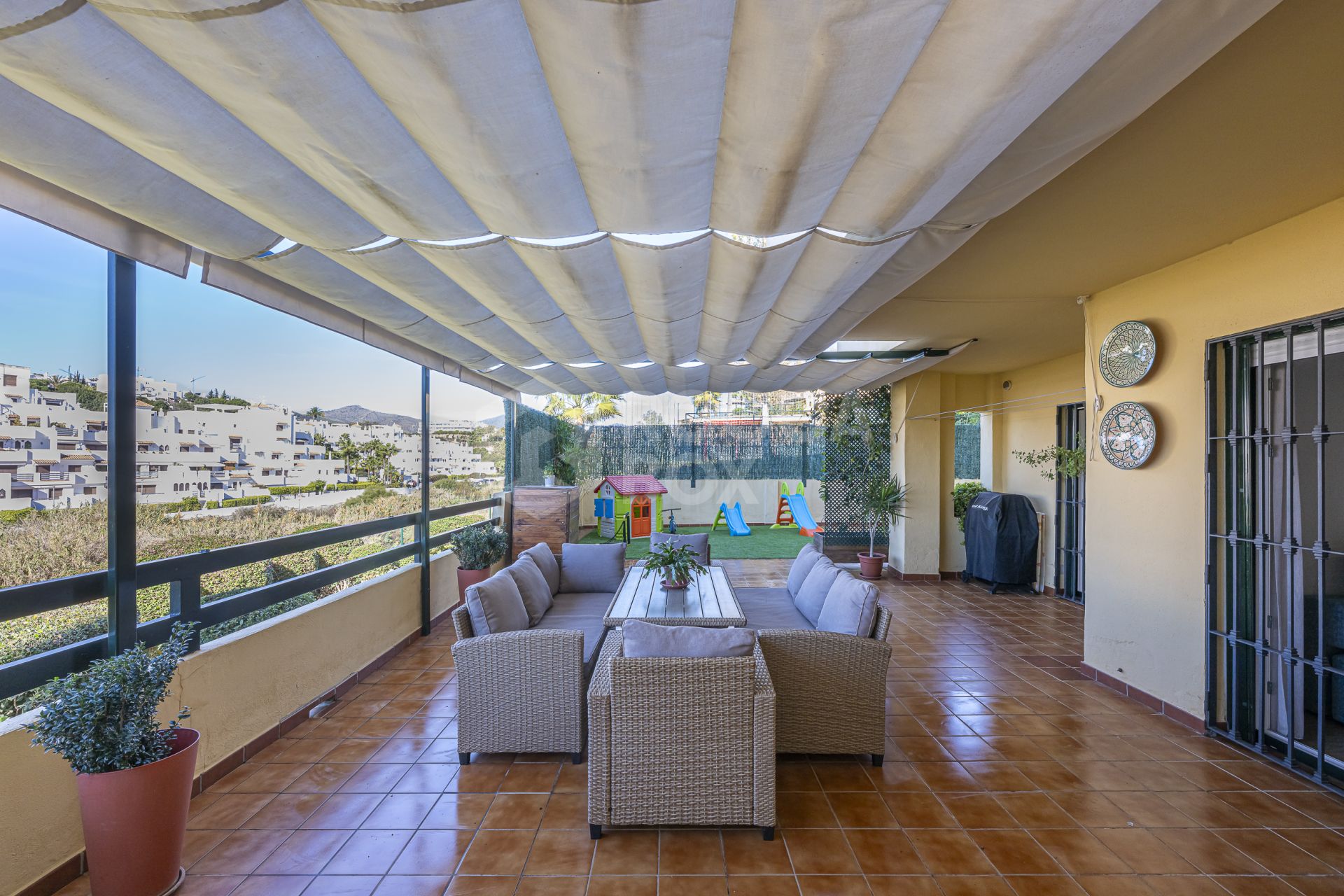 Immaculate Ground Floor Apartment with Expansive Terrace in Las Joyas, Estepona East