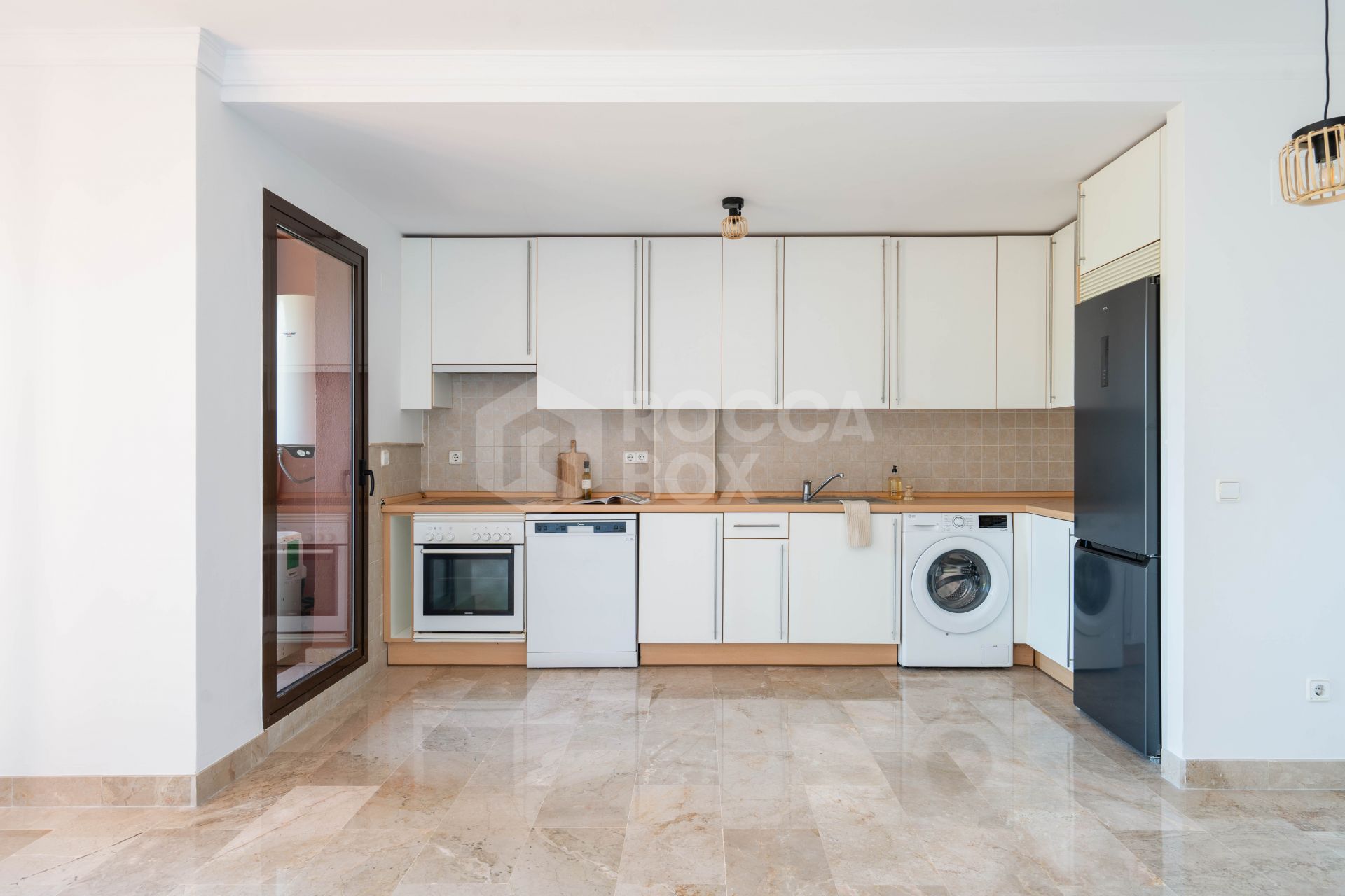 Elegant Coastal Living in Estepona – Corner Garden Apartment with Style & Serenity in Costa Galera