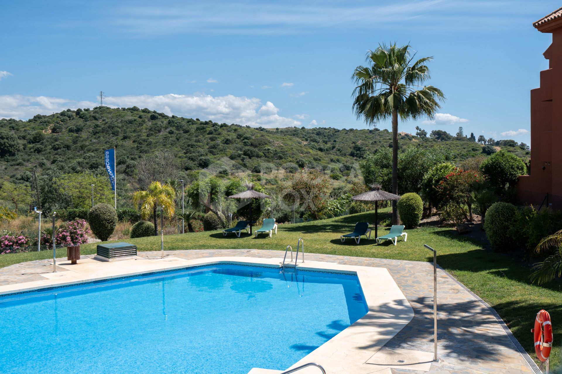 Elegant Coastal Living in Estepona – Corner Garden Apartment with Style & Serenity in Costa Galera