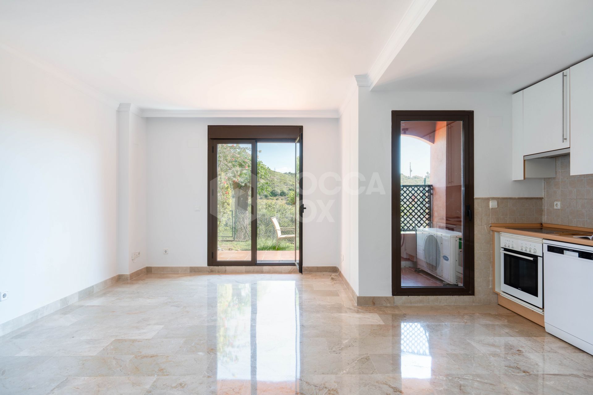 Elegant Coastal Living in Estepona – Corner Garden Apartment with Style & Serenity in Costa Galera