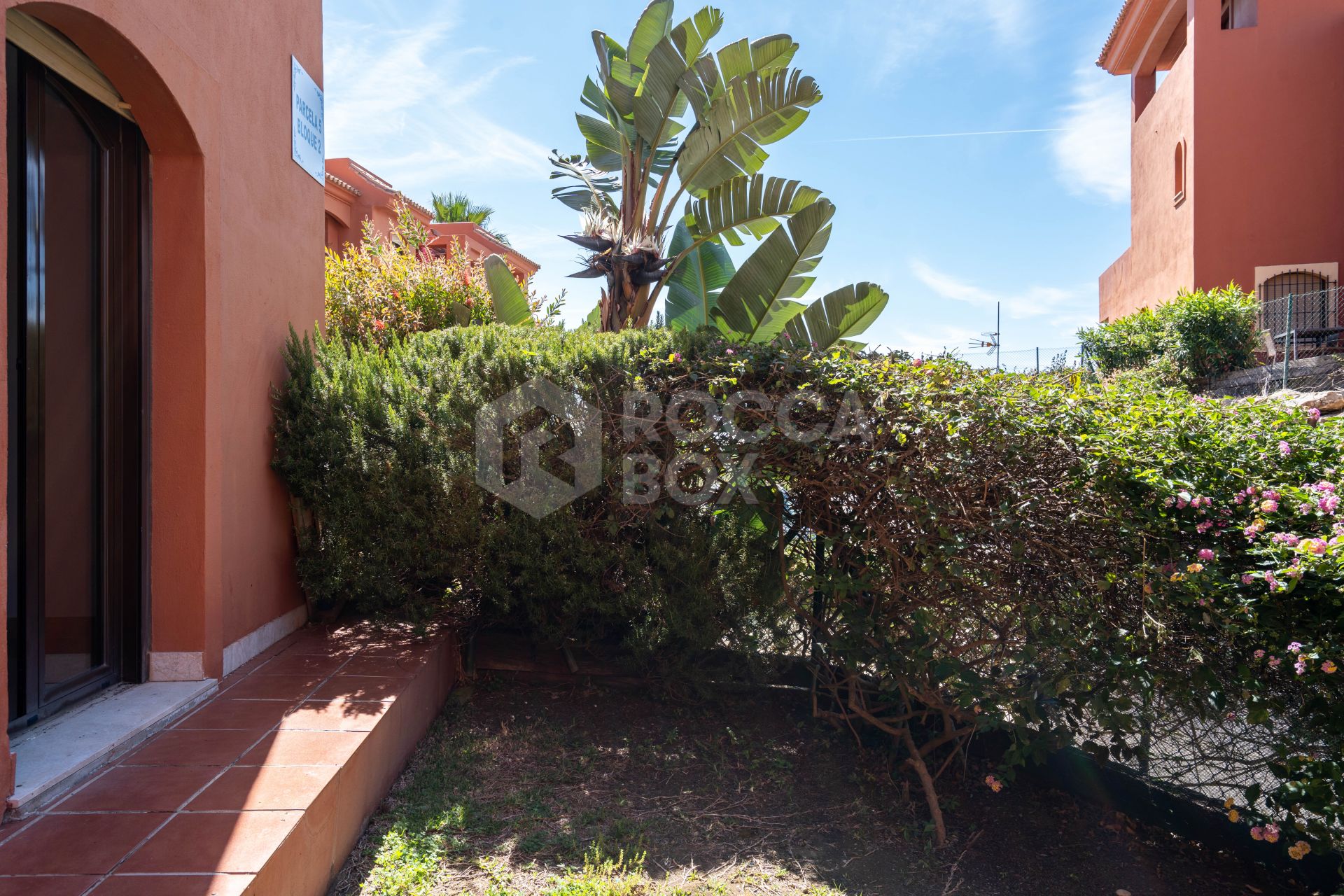 Elegant Coastal Living in Estepona – Corner Garden Apartment with Style & Serenity in Costa Galera
