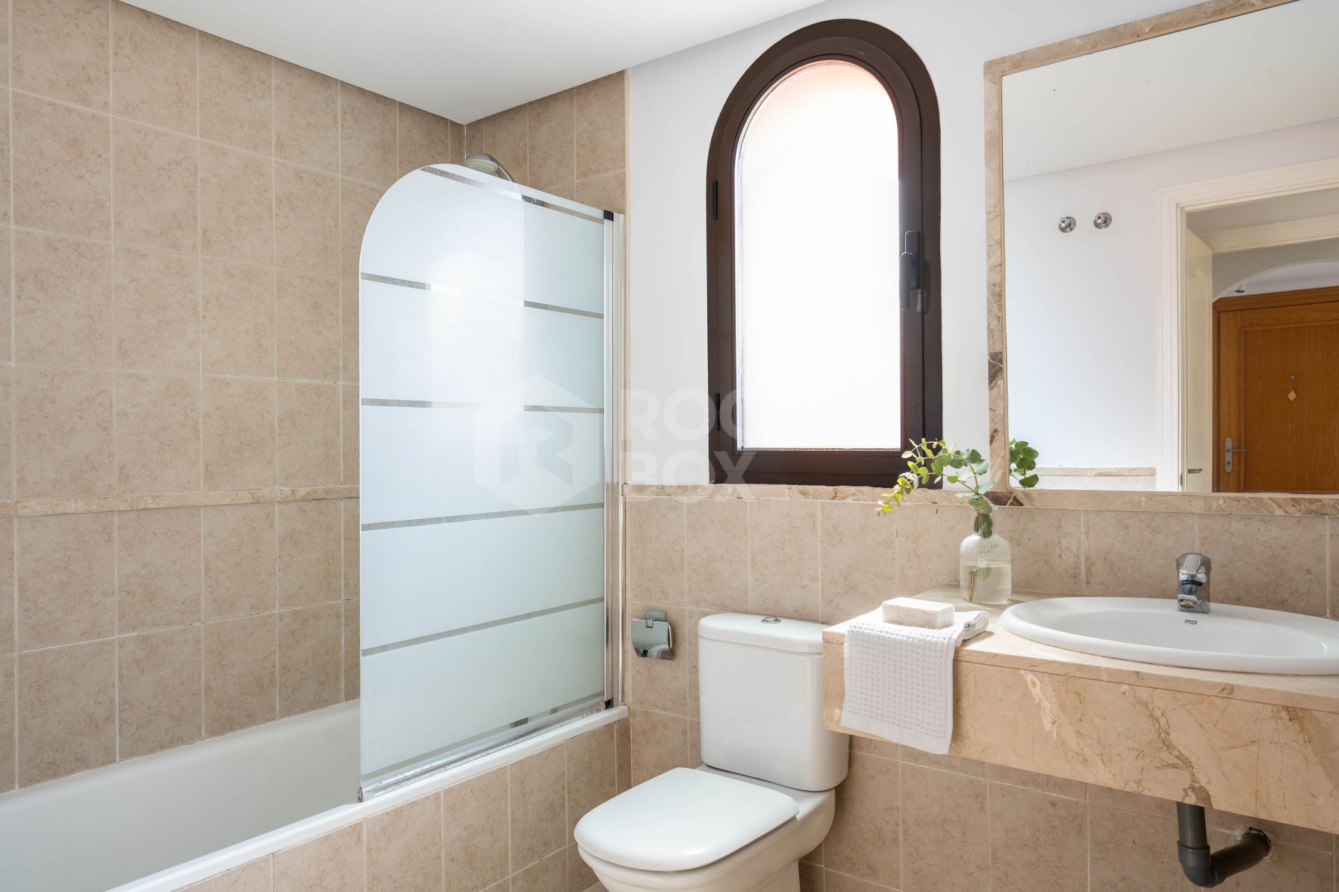 Elegant Coastal Living in Estepona – Corner Garden Apartment with Style & Serenity in Costa Galera