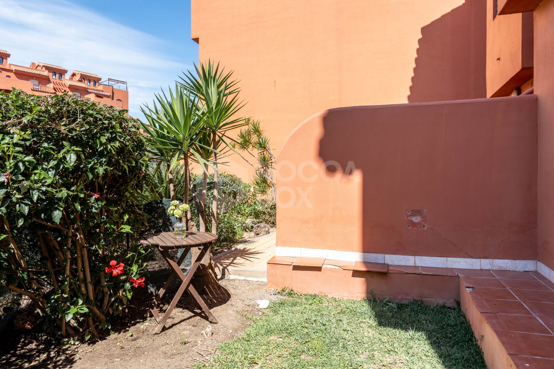 Elegant Coastal Living in Estepona – Corner Garden Apartment with Style & Serenity in Costa Galera