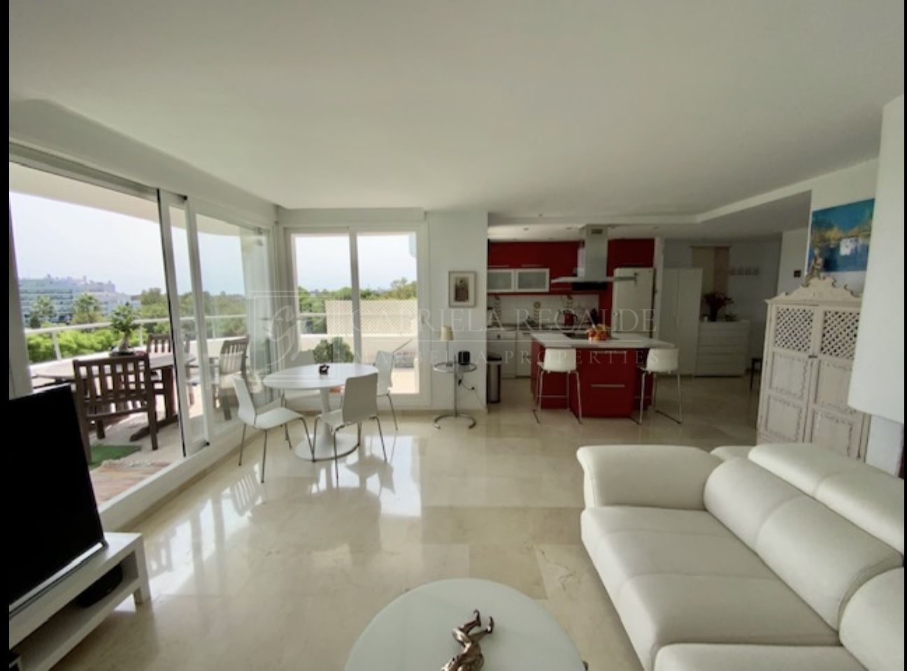 Bright apartment with open golf and sea views.