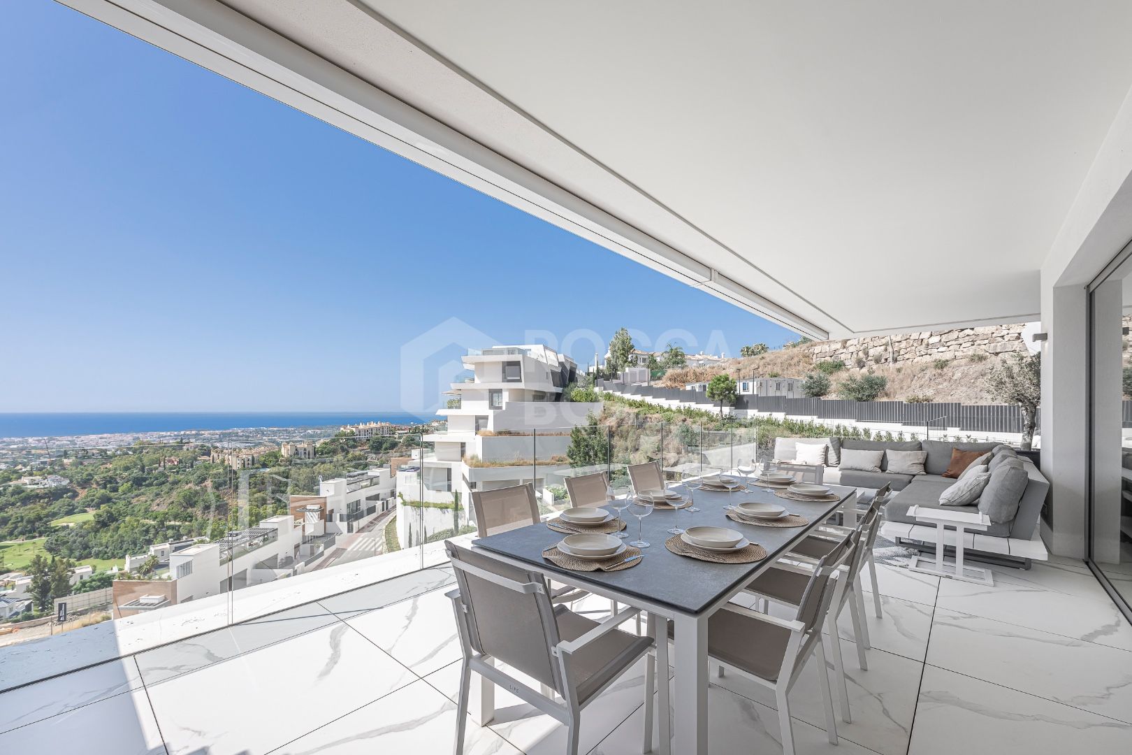 Stunning corner middle floor apartment with panoramic golf & sea views