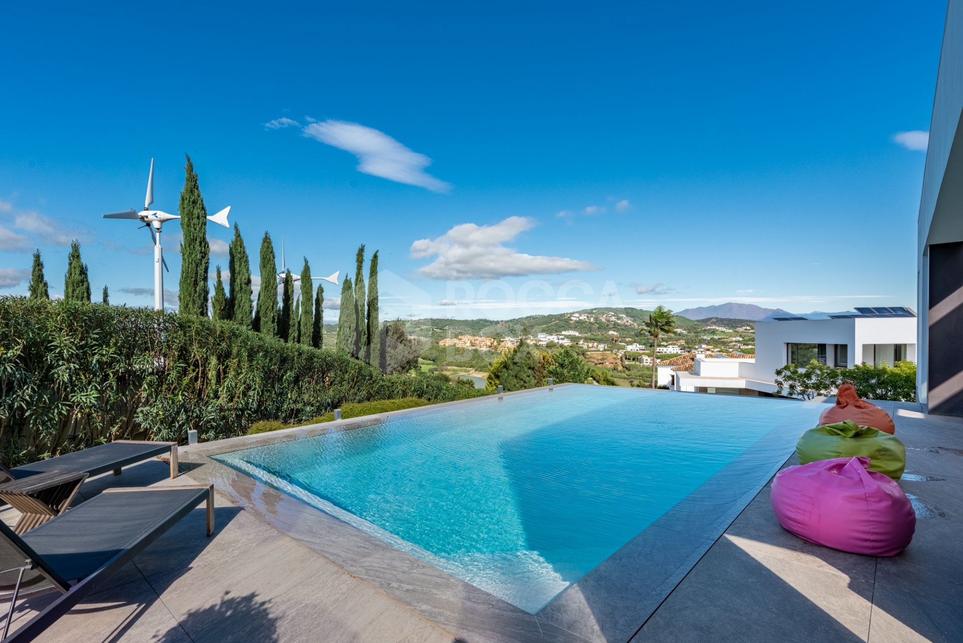 Multilevel contemporary style villa in a quiet location at the end of a cul-de-sac with views to the Almenara Golf Course.