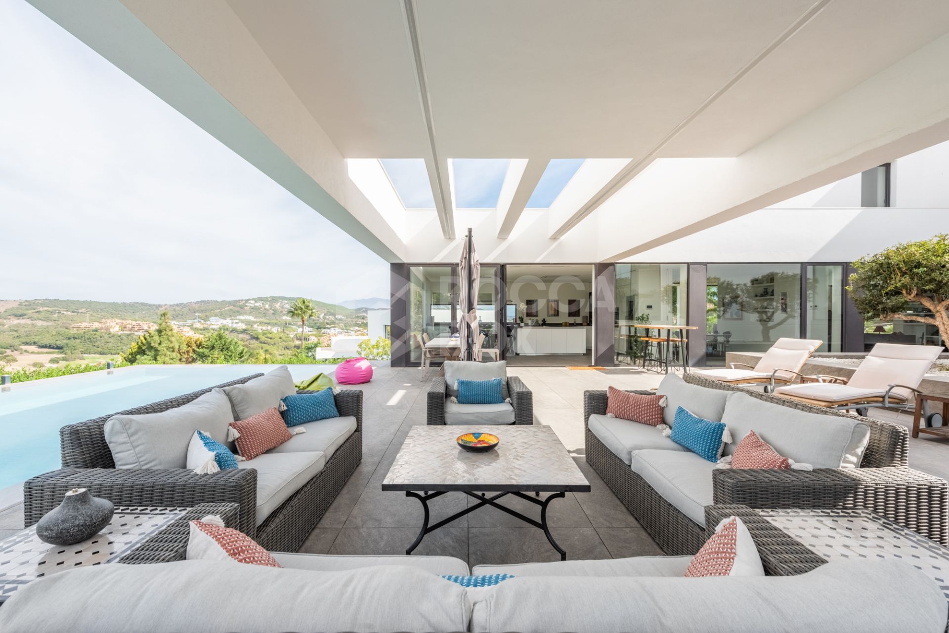 Multilevel contemporary style villa in a quiet location at the end of a cul-de-sac with views to the Almenara Golf Course.