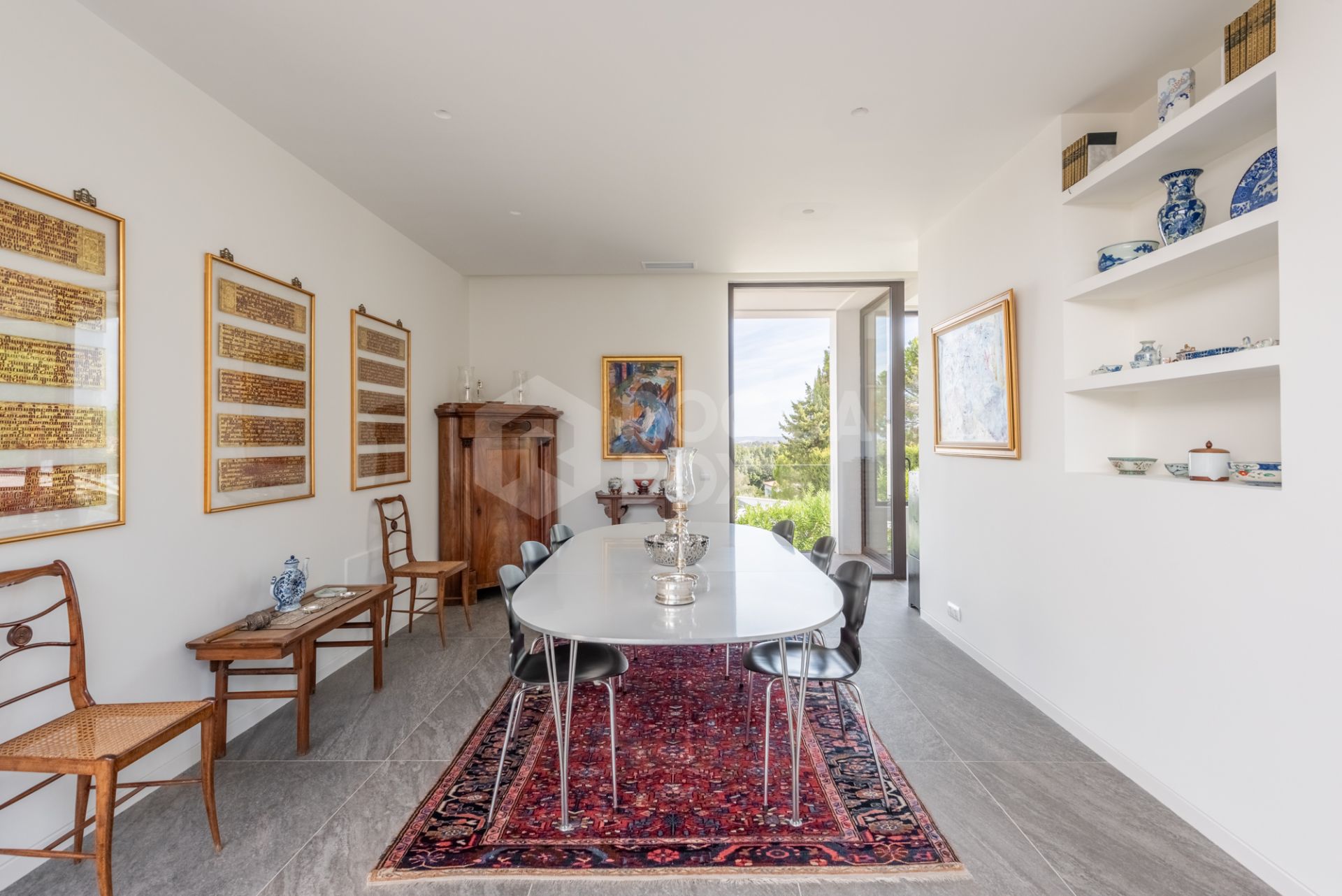 Multilevel contemporary style villa in a quiet location at the end of a cul-de-sac with views to the Almenara Golf Course.