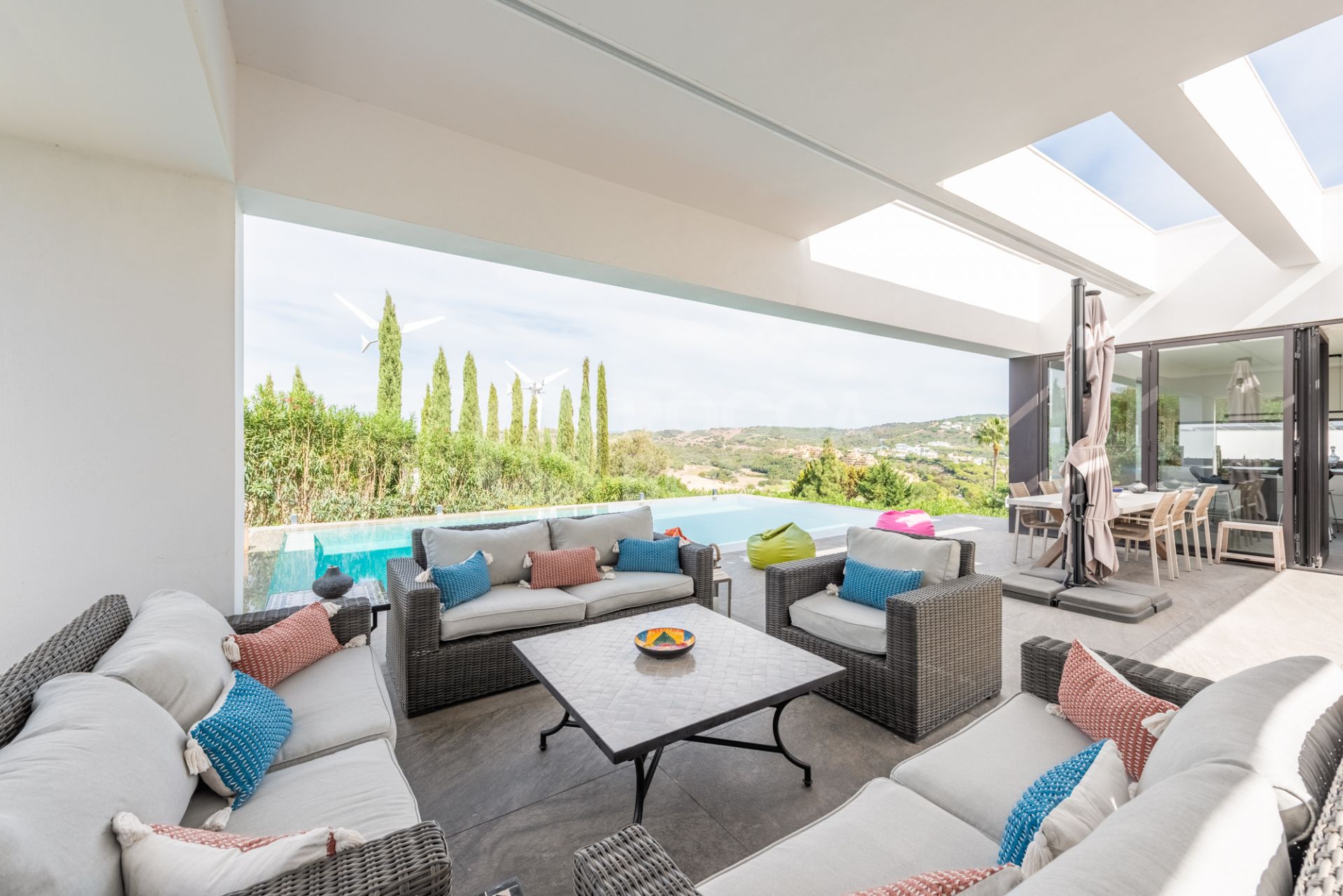 Multilevel contemporary style villa in a quiet location at the end of a cul-de-sac with views to the Almenara Golf Course.
