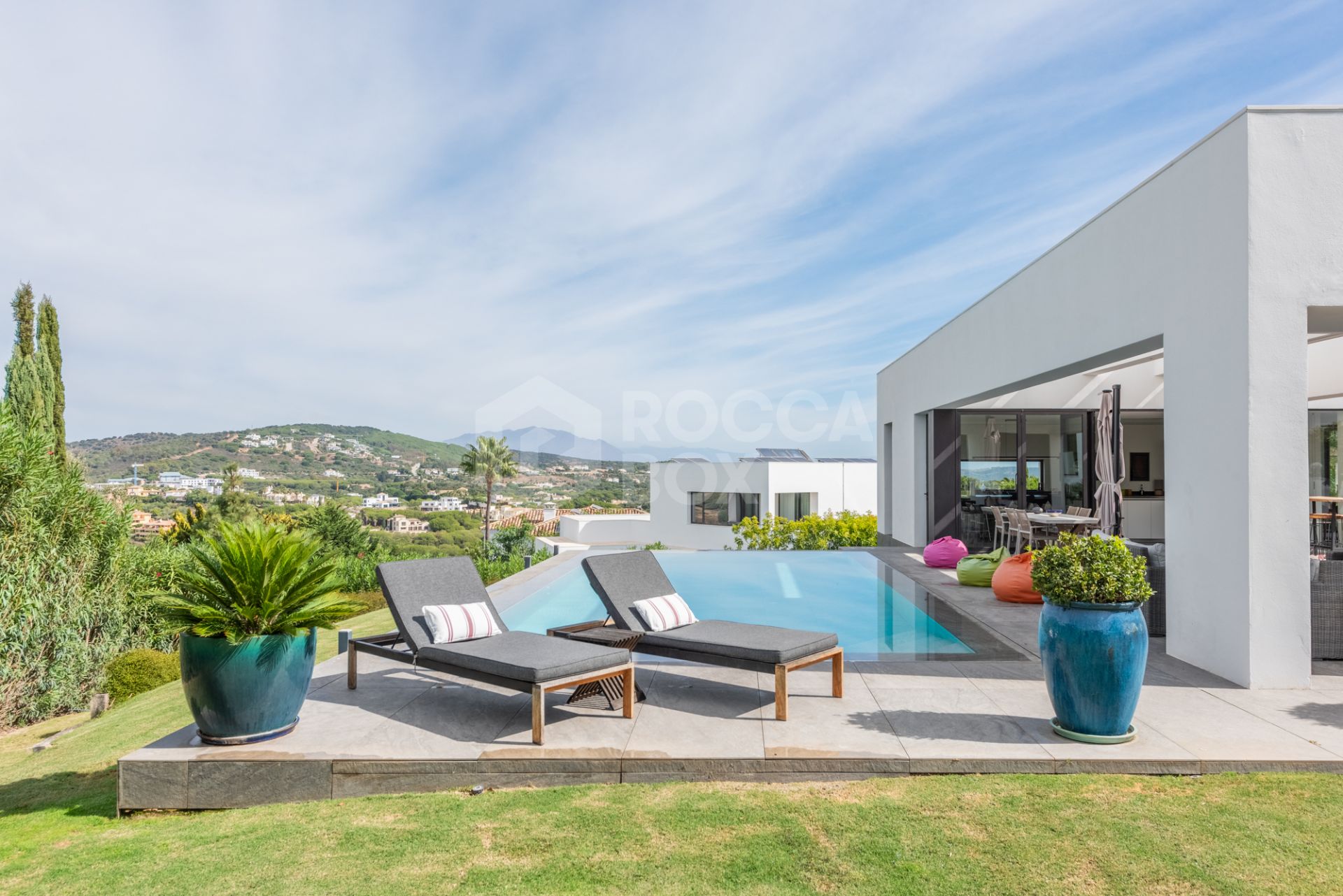 Multilevel contemporary style villa in a quiet location at the end of a cul-de-sac with views to the Almenara Golf Course.